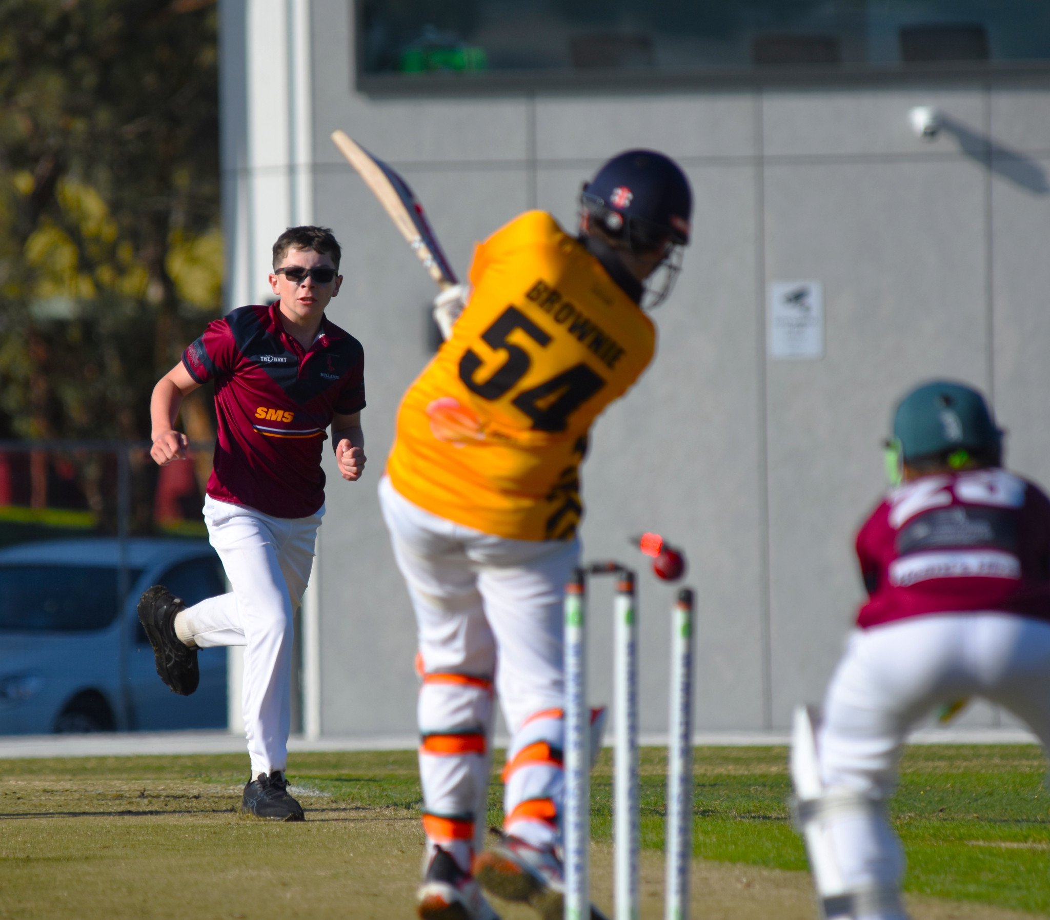 Angus Crute's delivery smashes the off stump to dismiss Harvey Brown.