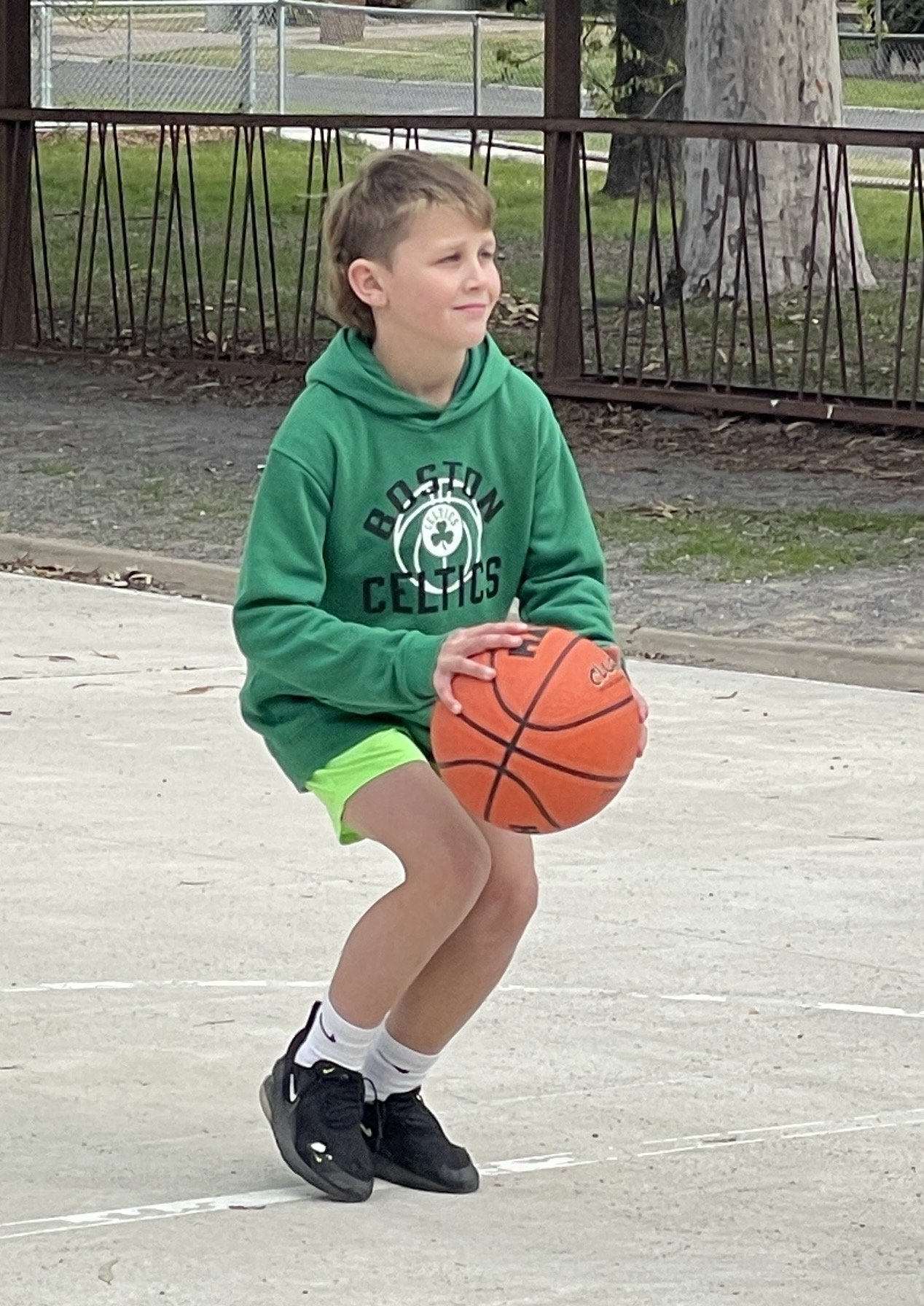 Benson Sleep lines up his shot at the basketball station.