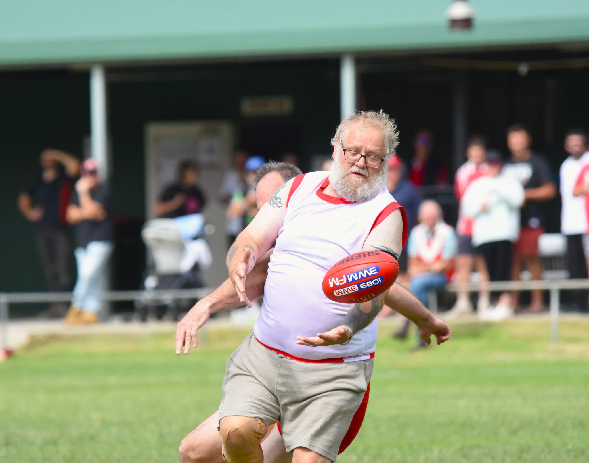 Daniel Watson juggles the ball before taking a mark in the Taylors Lake legends match, held at Dock Lake Recreation Reserve on Saturday, March 28.