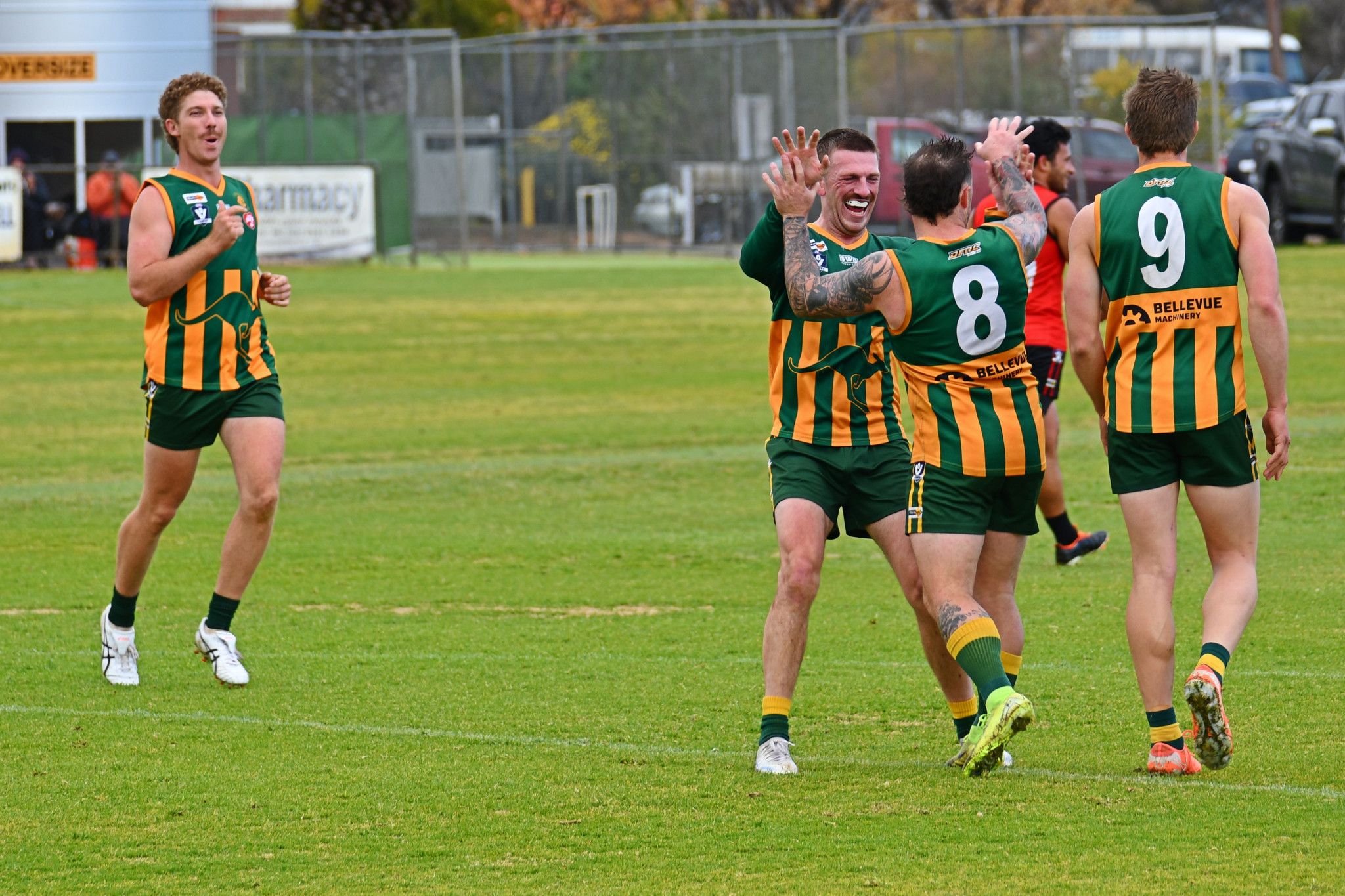 Dimboola players celebrate a goal during their historic senior football elimination final win against Stawell. The Roos won 114-100 in a double overtime thriller.