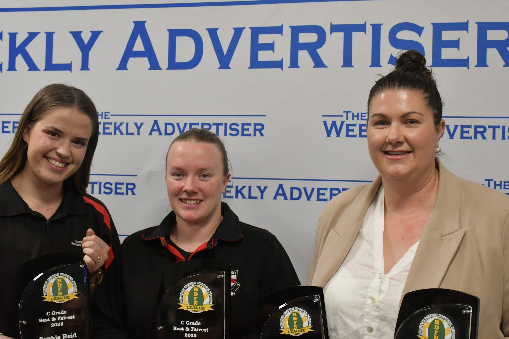 C grade netball award winners from left to right: best and fairest winners Sophie Reid (Noradjuha Quantong) and Abby Hepburn (Edenhope Apsley), runner up and leading goal shooter Lana Ellis (Pimpinio).