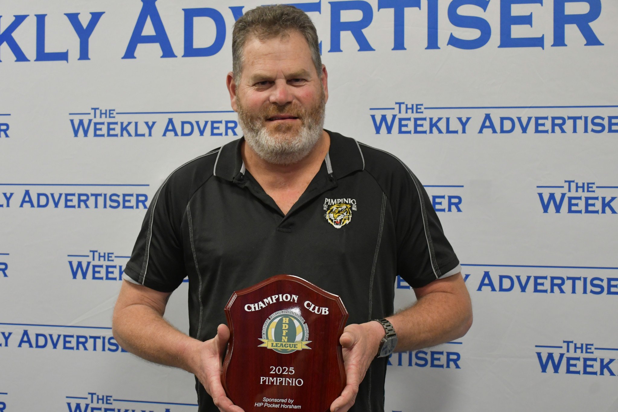 Pimpinio president Jock Baker with the 2025 HDFNL club championship award.