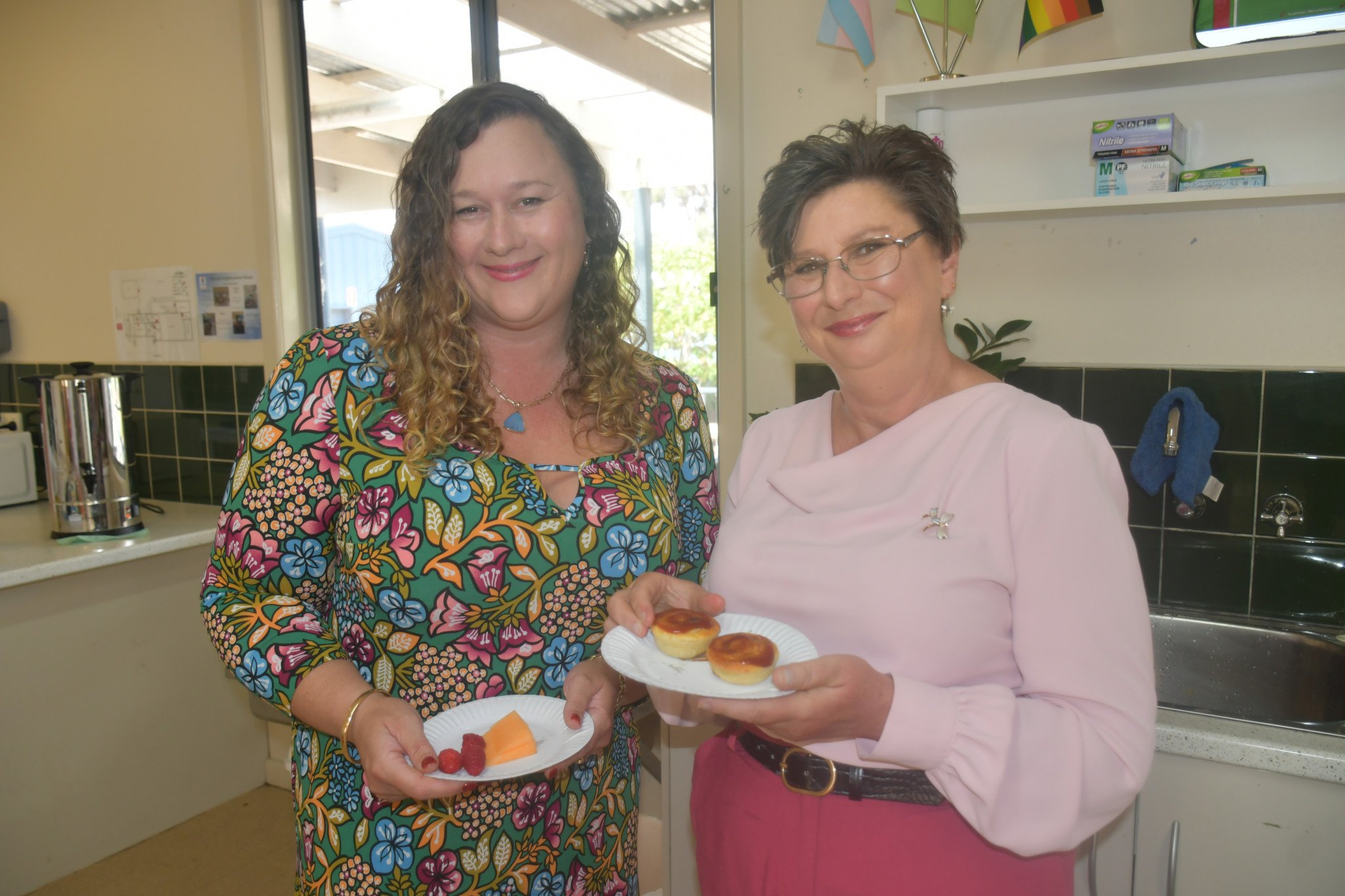 Jess Adler from Wimmera Southern Mallee Development with the resident Naomi Summers at the Horsham Neighbourhood House during Harmony Day celebrations.