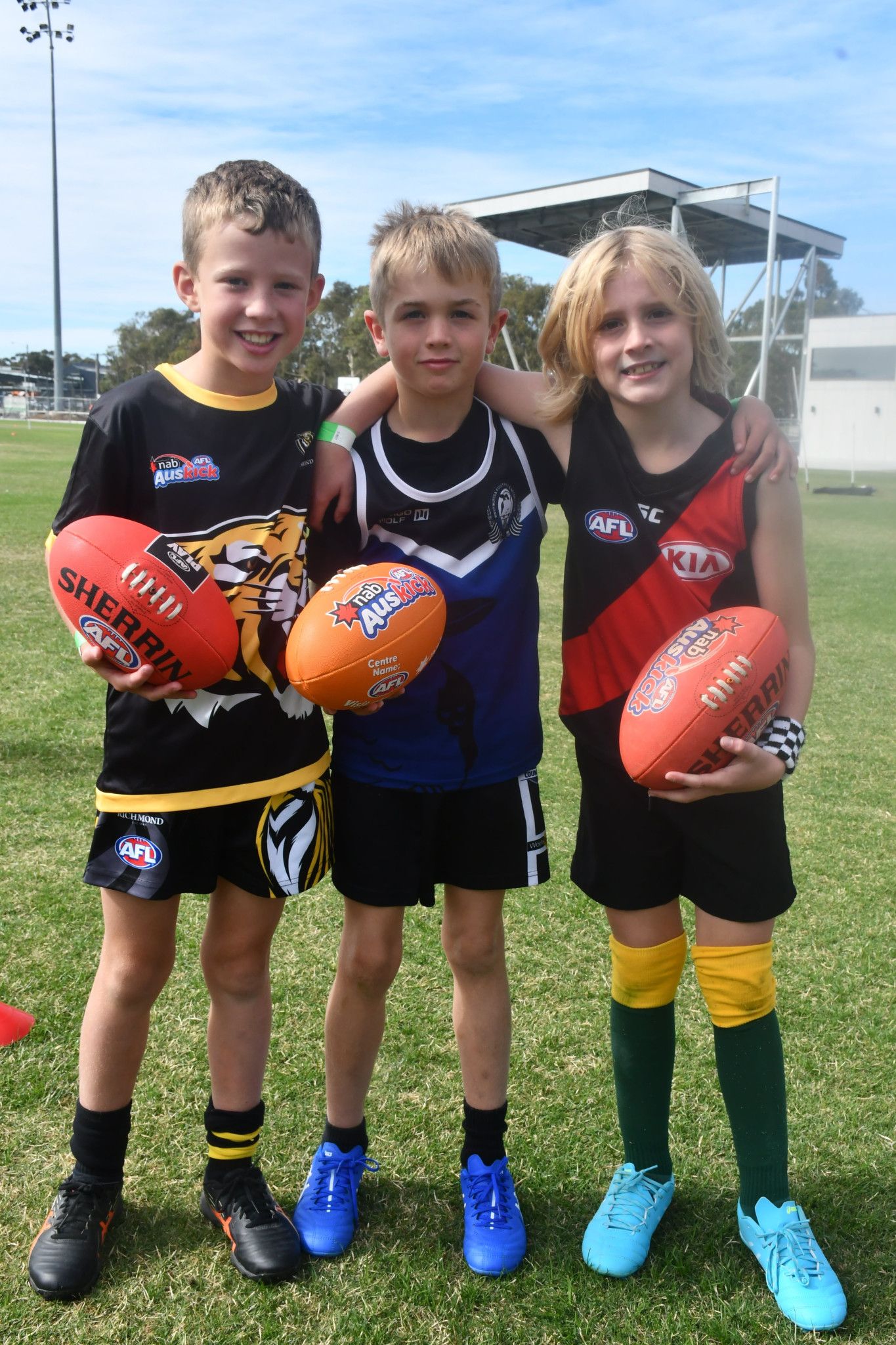 Jake, 8, of Horsham, Alife, 9, of Kewell and Milo, 8, of Dimboola had their best time at the Horsham School Holiday Program at the City Oval on Wednesday.