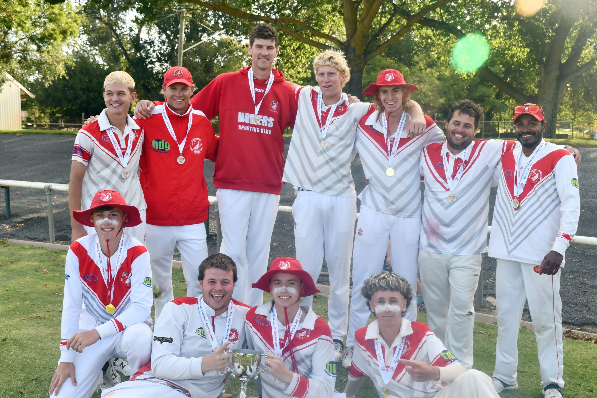 The Homers 2024-25 A grade premiership team. The club's grand final victory meant Homers won back-to-back Horsham Cricket Association A grade premierships.