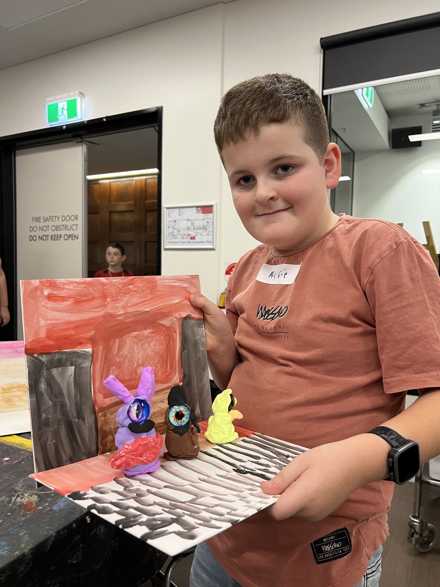 Alfie, 10, pictured with his self made monsters.