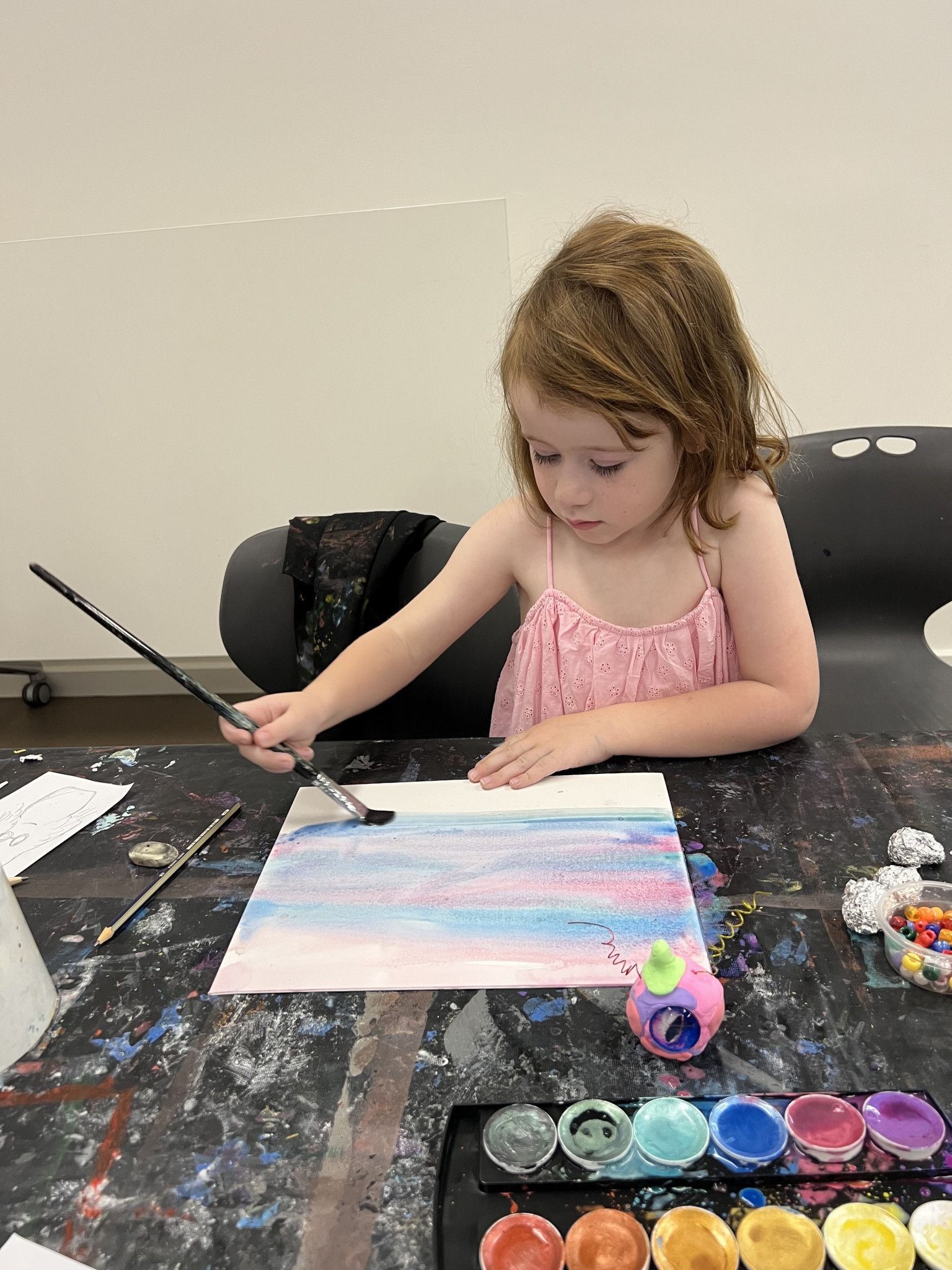 Eldie, 5, painting during school holiday activity at the Horsham Art Gallery.