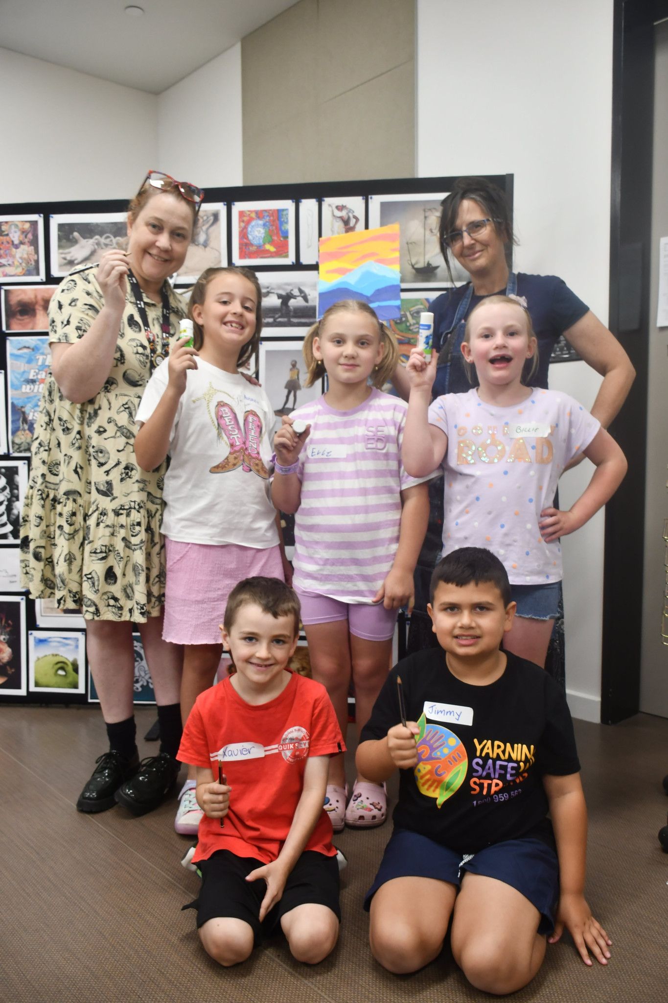 Horsham Town Hall public art officer Larissa Riddell and art tutor Michelle Watson are having a laugh with the participants, Audrey, Evie, Billie, Xavier and Jimmy, after the activity.