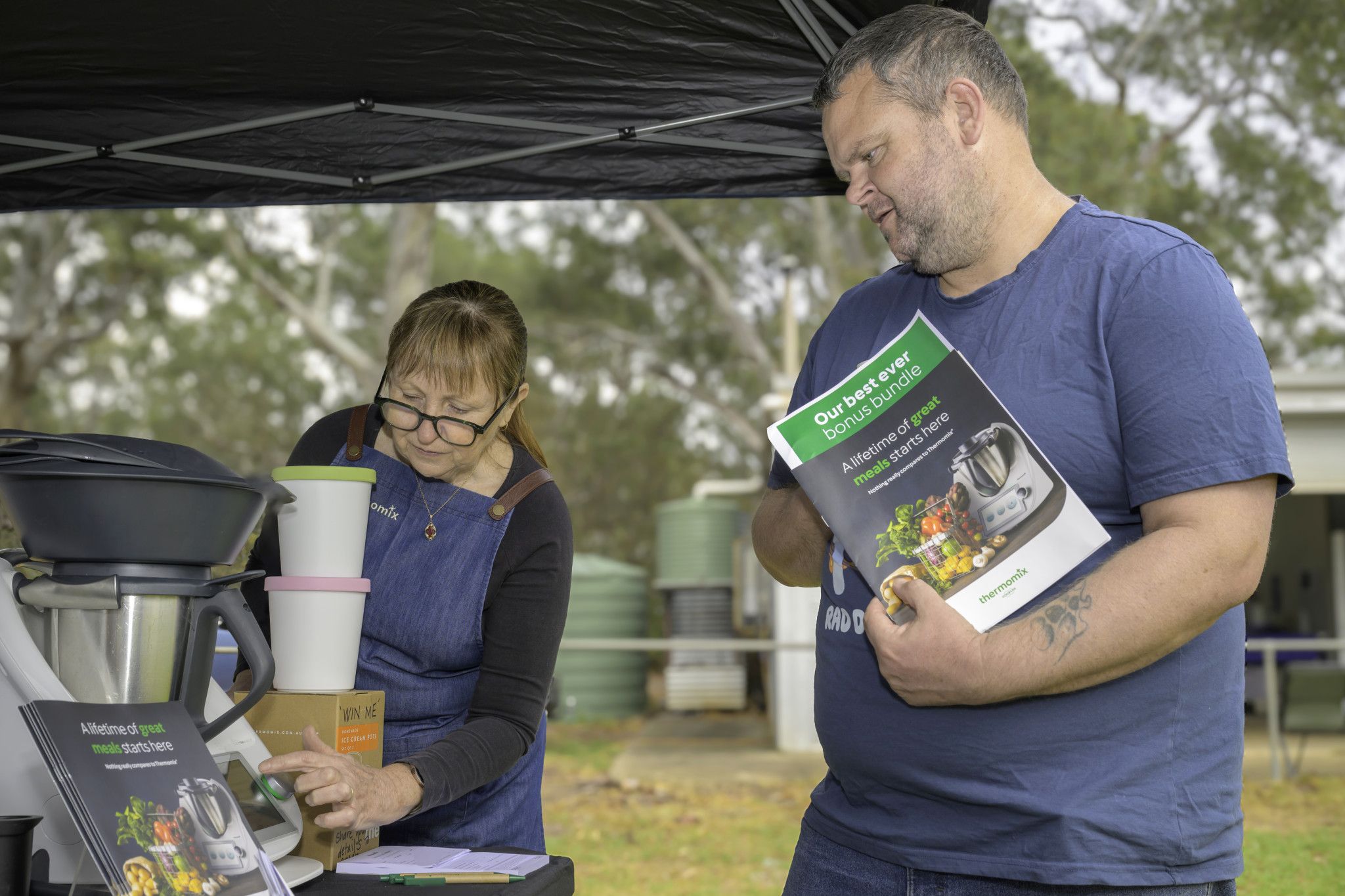 Gill Elliot explains the virtues of products to Michael White.