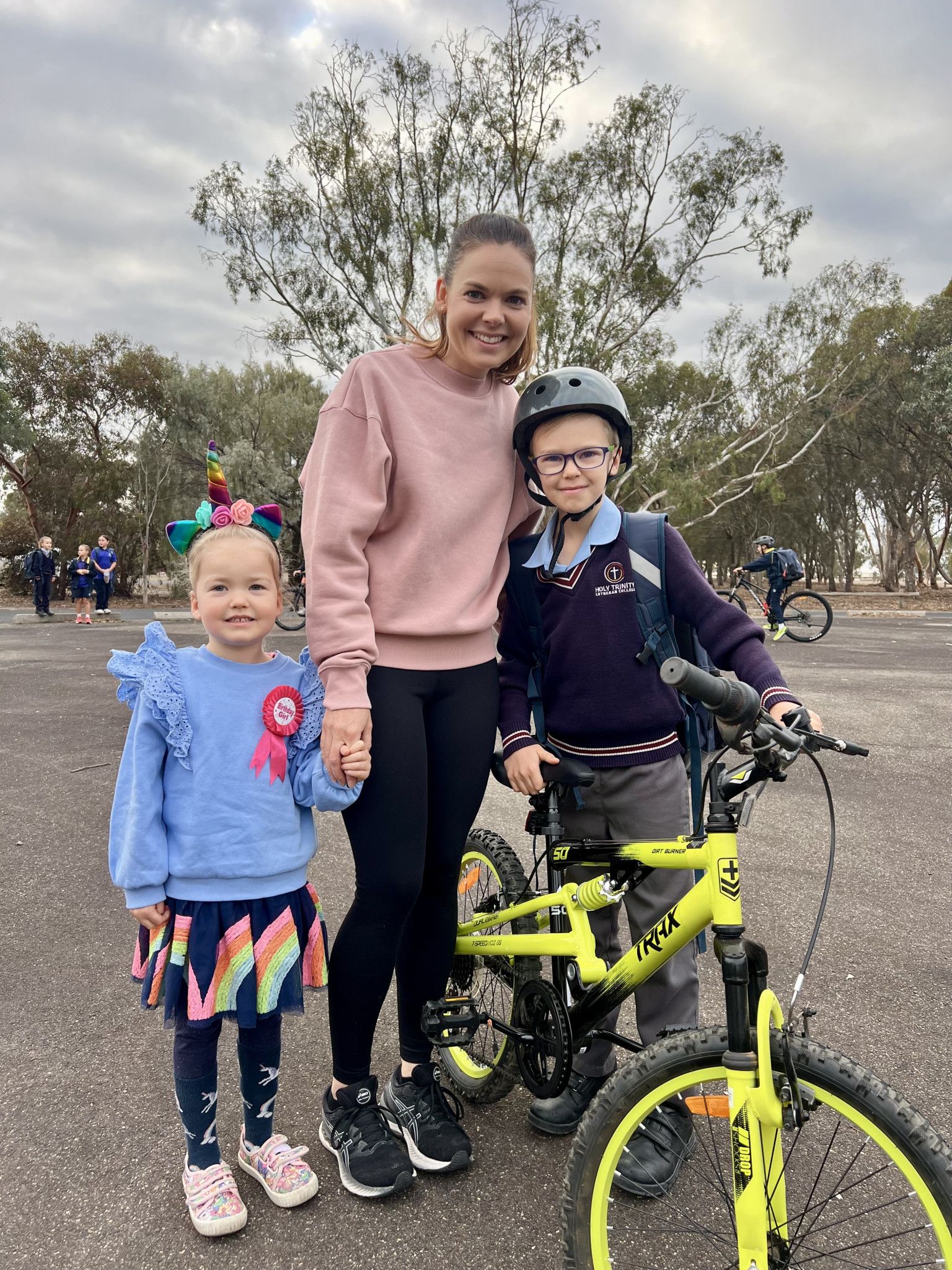 Birthday girl Ella, 5, with mum Simone Aikten and brother Brodie, 8 on Walk to School Day.