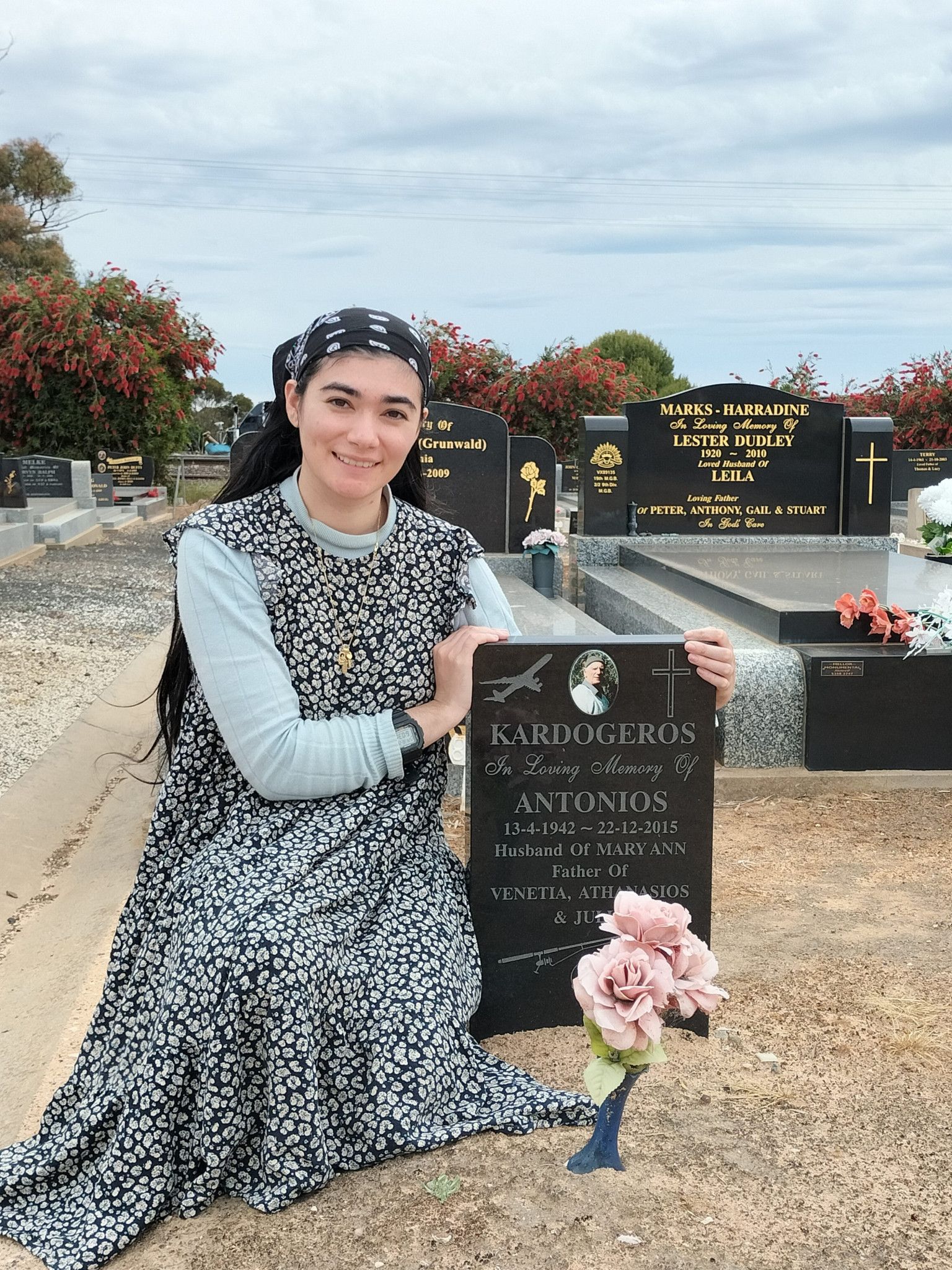 Venetia Maria at her dad's grave.