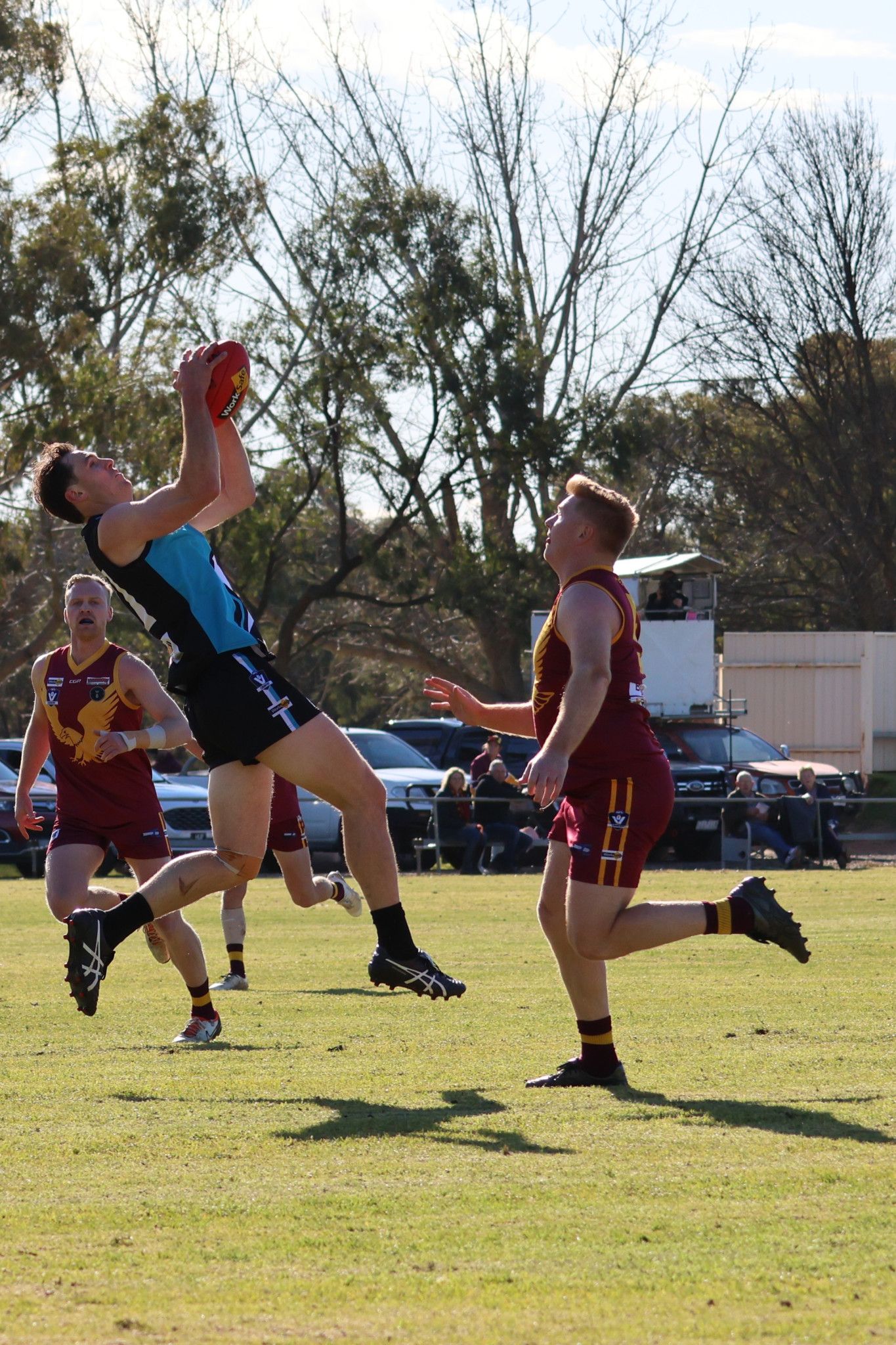 Sam White takes a mark.