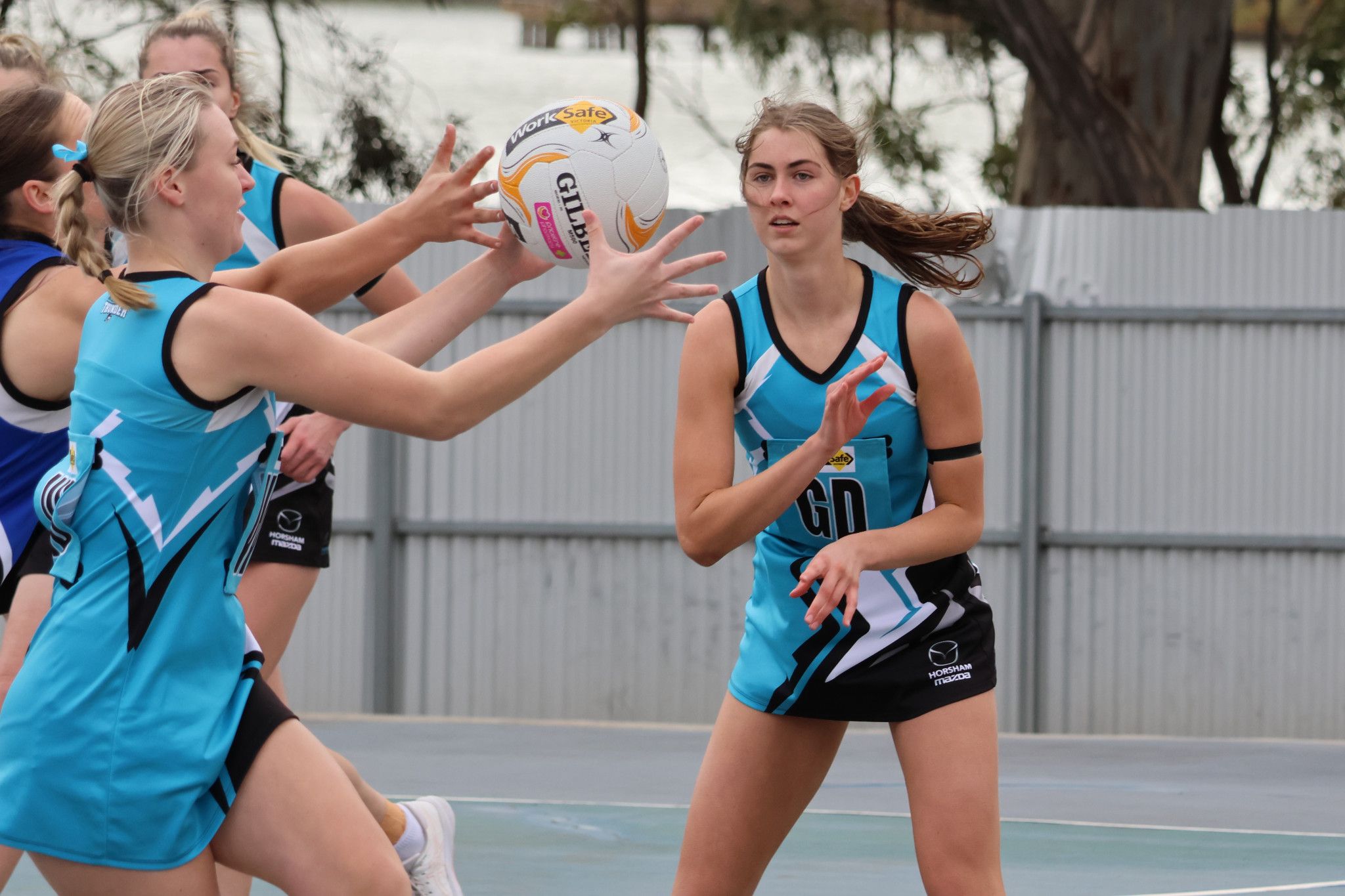 Southern Mallee Thunder's Abby White passes the ball to Taya Horman. Photo: LES GRAETZ