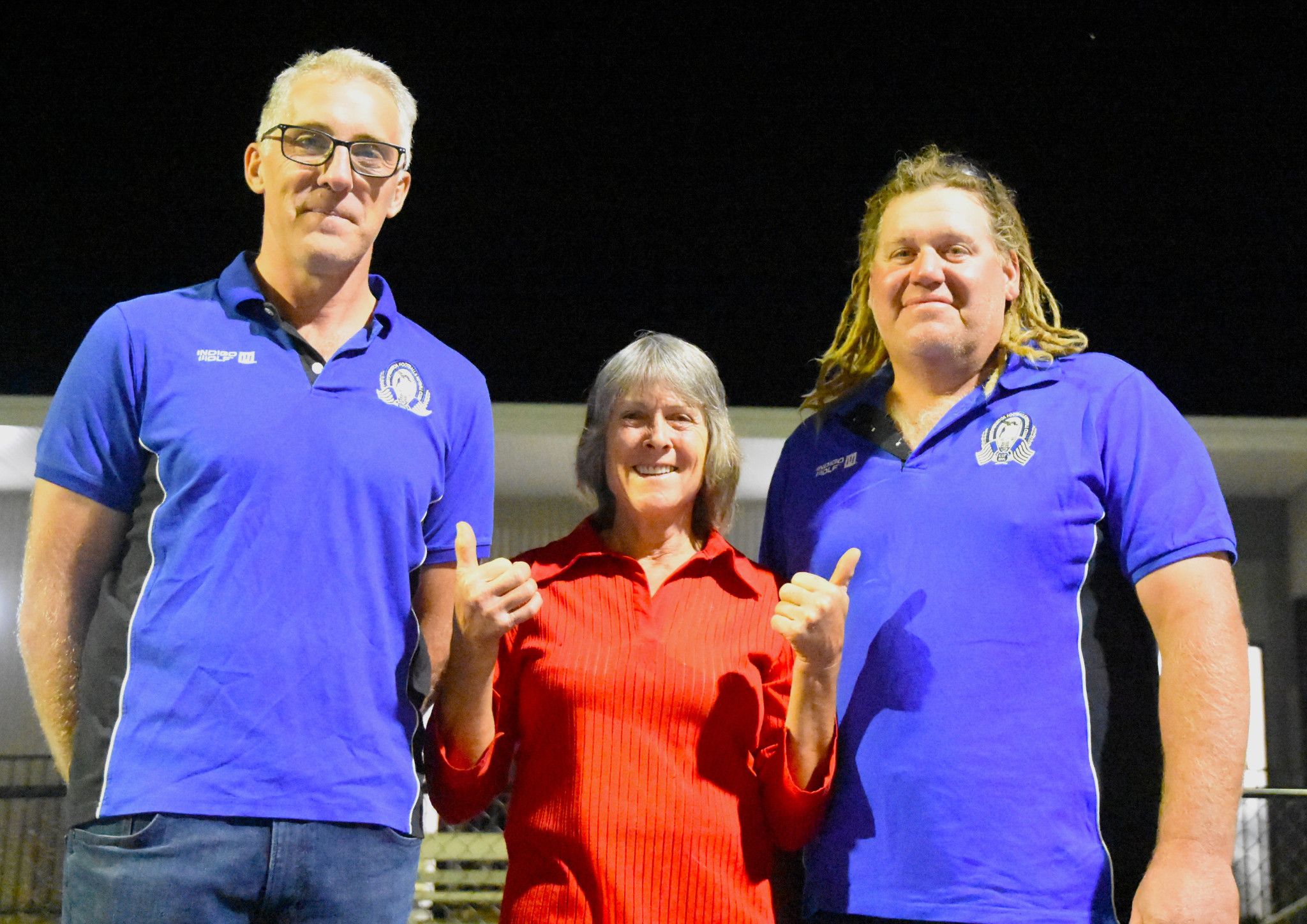 Minyip Murtoa Football Netball Club president Chris Delahunty, Yarriambiack Shire councillor Corrine Weintze and Brent Hudson stand on the new netball court at Minyip Recreation Reserve.