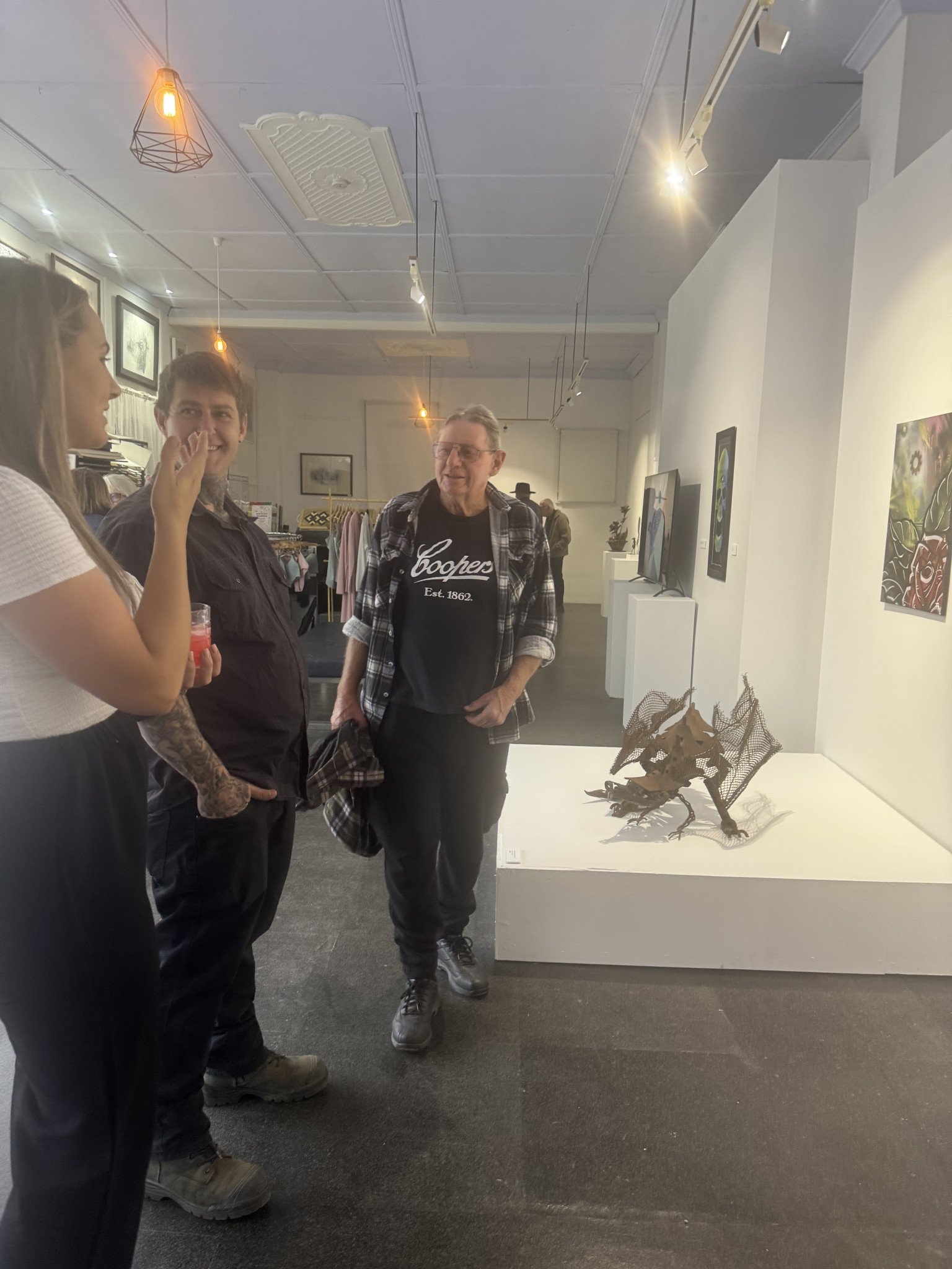 Mariah Heinrich, Andy Morris and Don Pedder at the opening night of the exhibition.