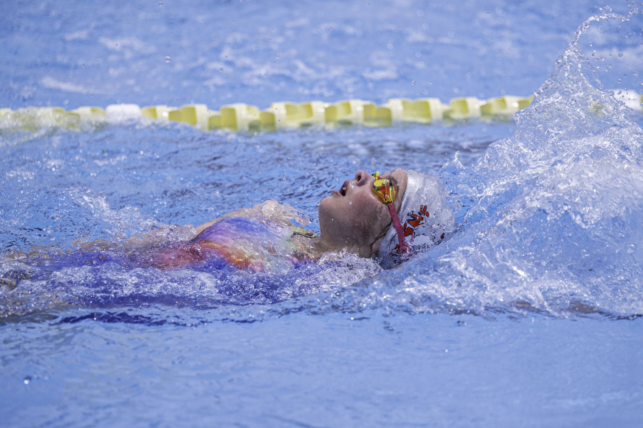 Layla Glatz from Horsham Swimming Club swims the backstroke leg in the 200 metre medley relay.