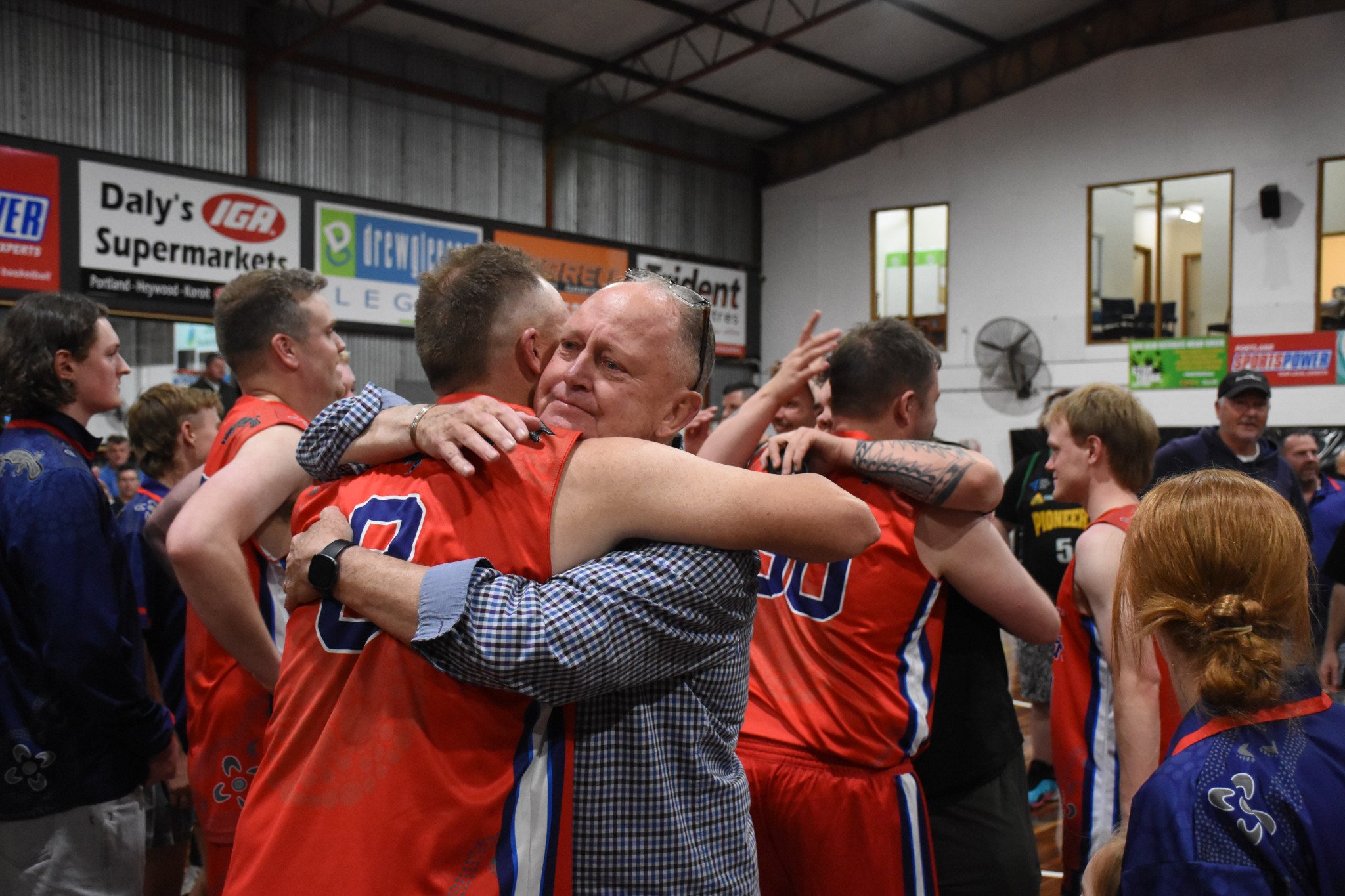 An emotional Bill Lovel hugs his son Jono. PHOTO: CHRIS GRAETZ
