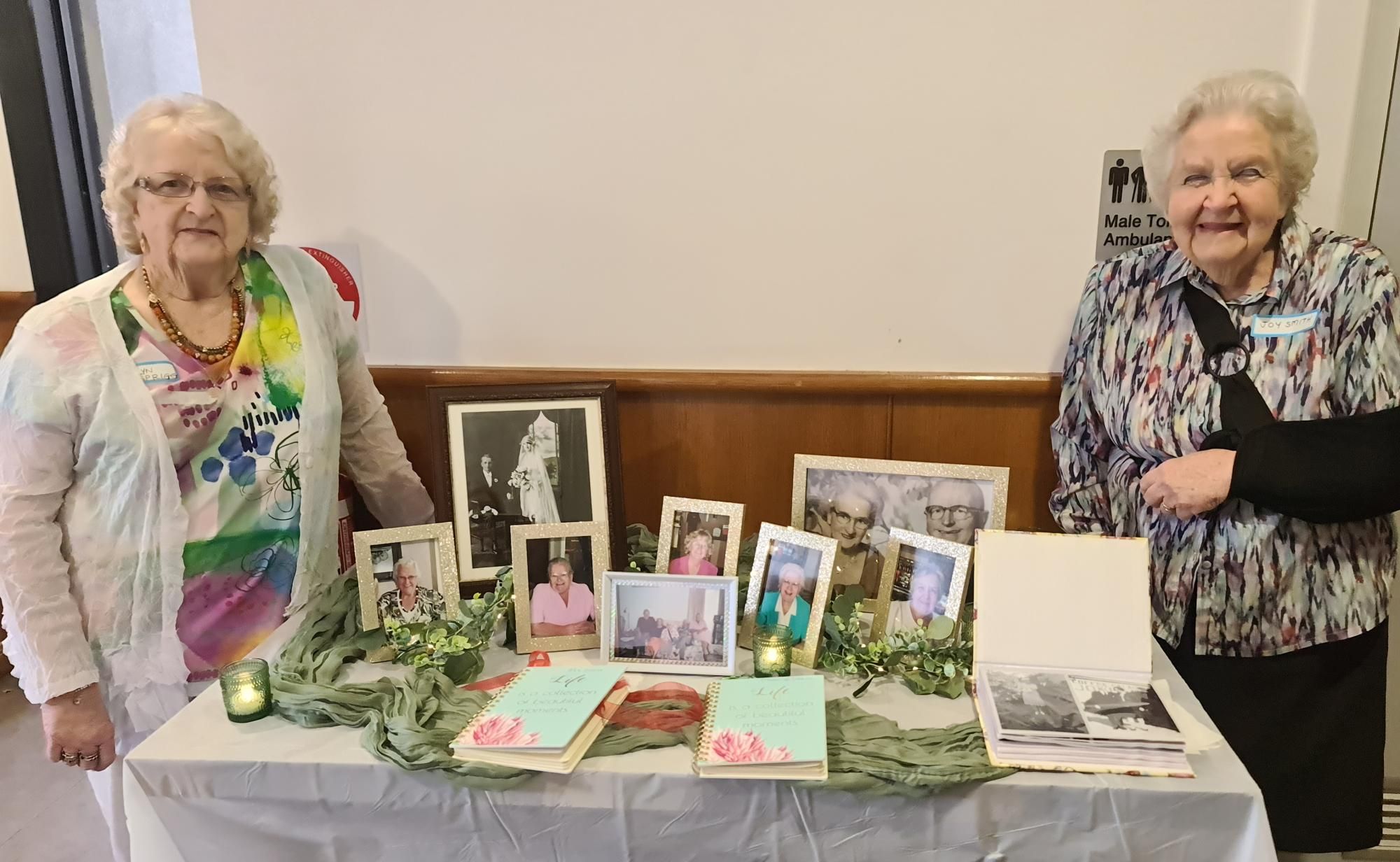 Merelyn Spriggs and Joy Smith, daughters of Perc and Ada Jones, at the family reunion in October 2024 in Horsham with photos of their parents wedding. Picture by Sheryl Lowe