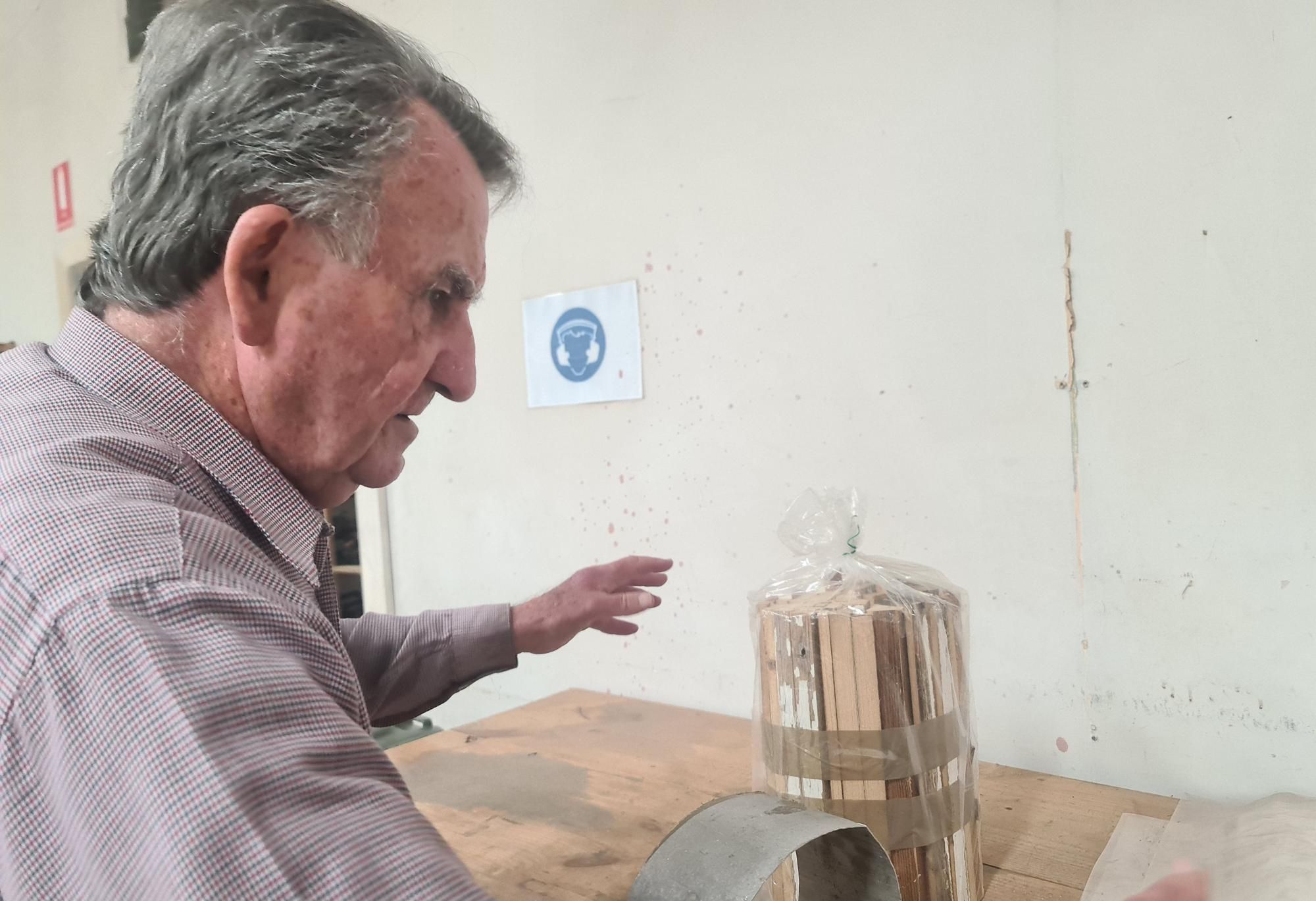 Acclaimed writer Gerald Murnane with the kindling he helps prepared to raise funds of the Goroke men's Shed, Picture by Sheryl Lowe