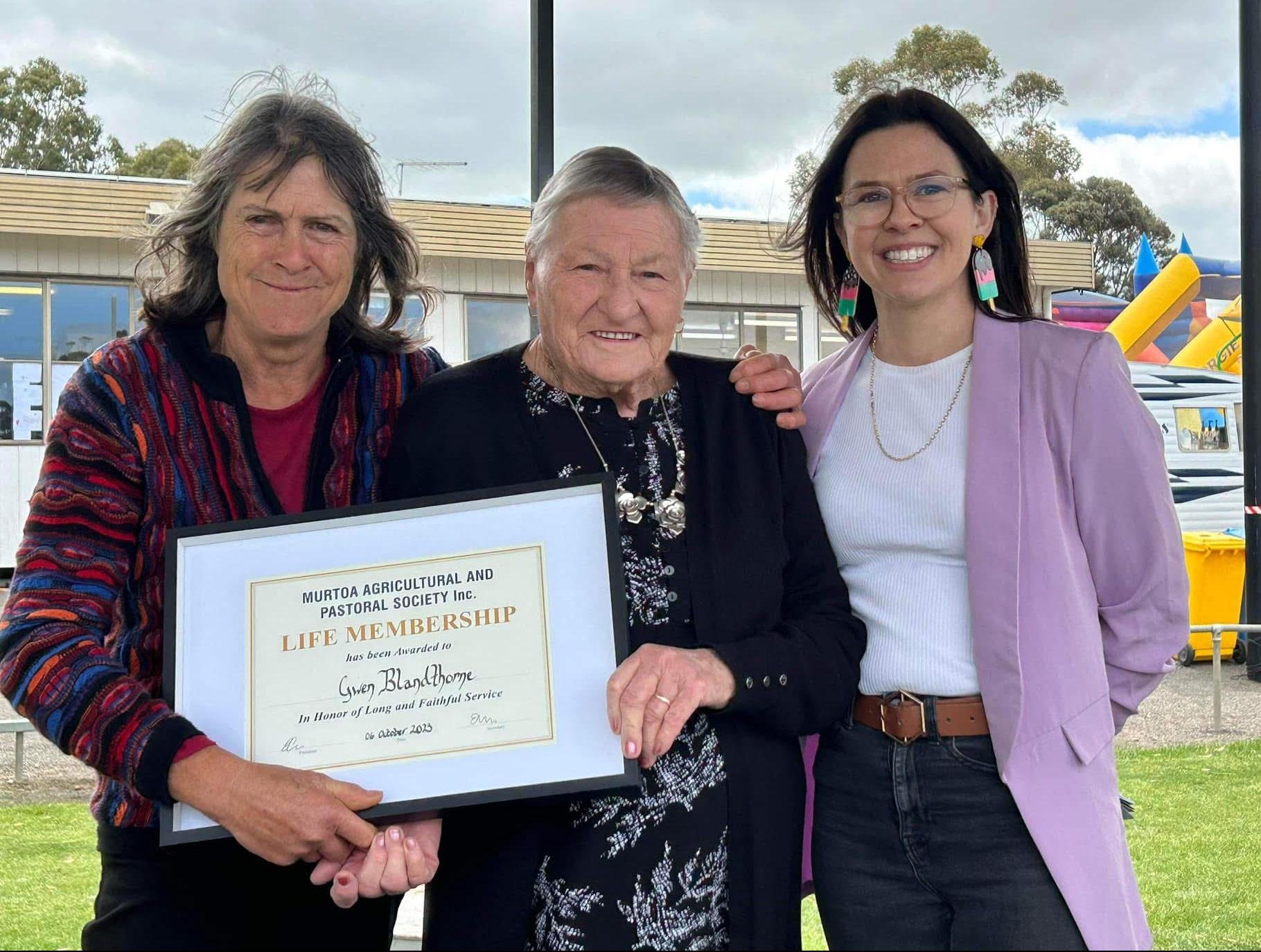 Gwendoline Blandthorn, middle, receiving her Murtoa Agricultural and Pastoral Society life membership in 2023 from society president Bree Childs and Yarriambiack Shire Councillor Cr Corinne Heinz. Picture supplied
