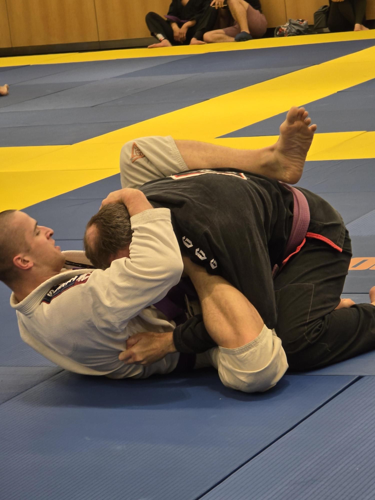 Bywater (left) in action at the BJJ Roots world championships in Singapore. Picture supplied