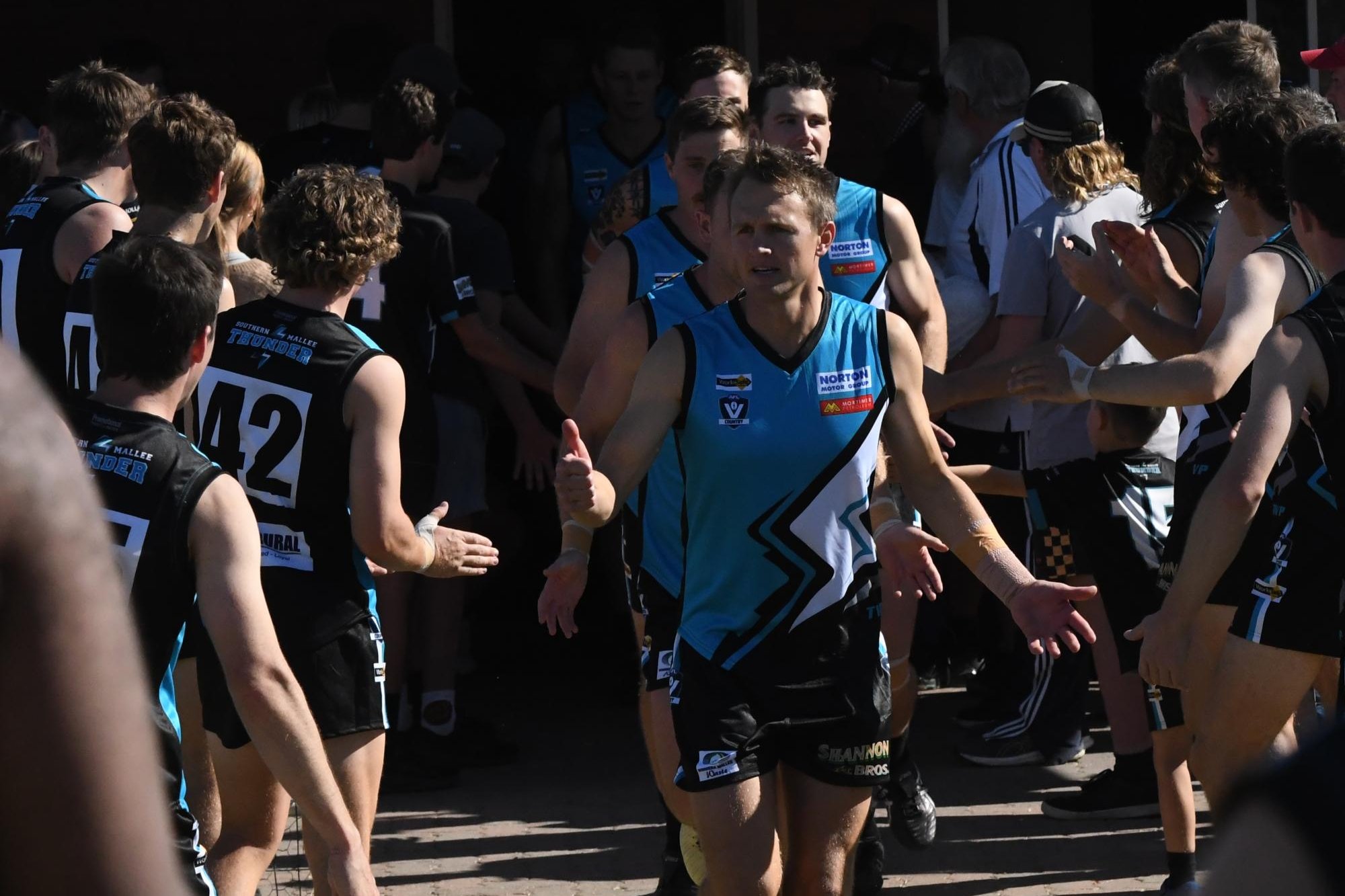 Coleman Schache leads out the Southern Mallee Thunder in round one of the WFNL season. Picture by Lucas Holmes