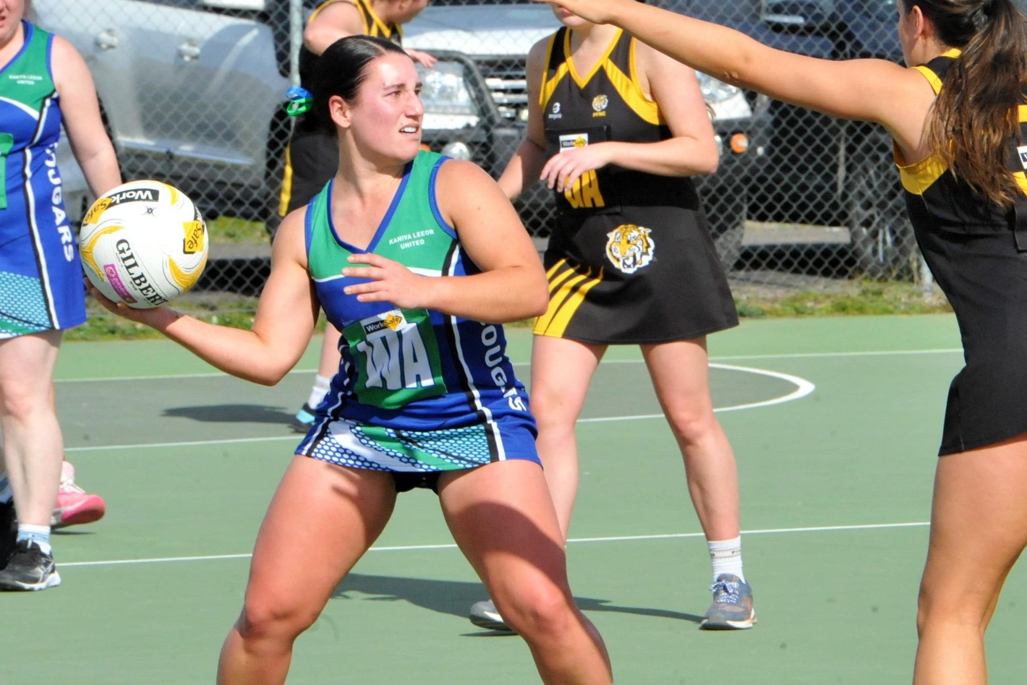Kaniva Leeor United's Sinead Kuchel has the ball in hand against Pimpinio and looks for a passing option. Picture by John Hall