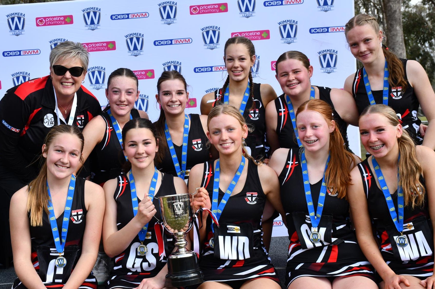 The Horsham Saints under 15 netball team celebrates winning the WFNL premiership. Picture by Ben Fraser
