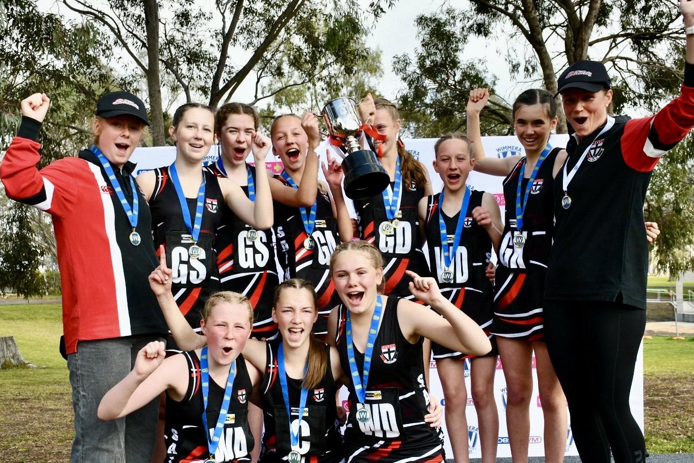 The Horsham Saints 13 & under netball team celebrate victory in the WFNL grand finals. Picture by Ben Fraser