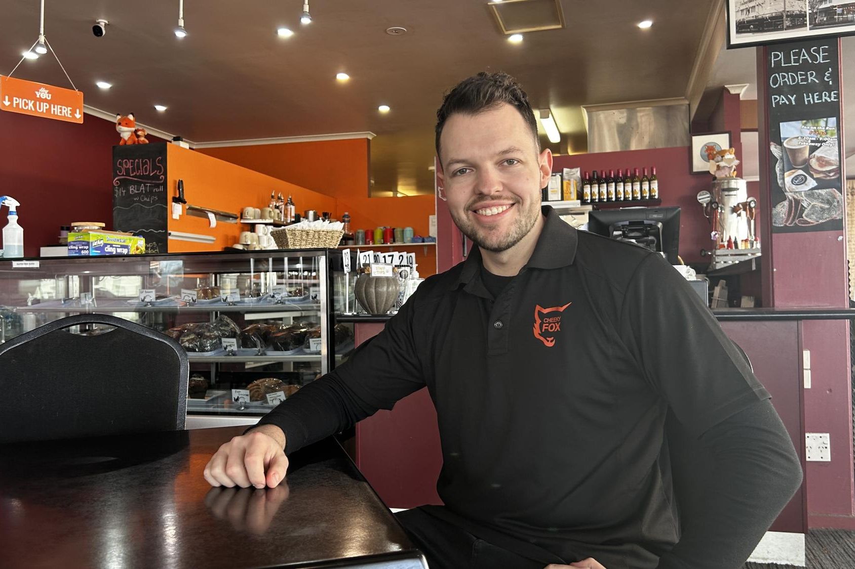 Cheeky Fox's new owner Hamish Johns in the Firebrace Street cafe. Picture by John Hall