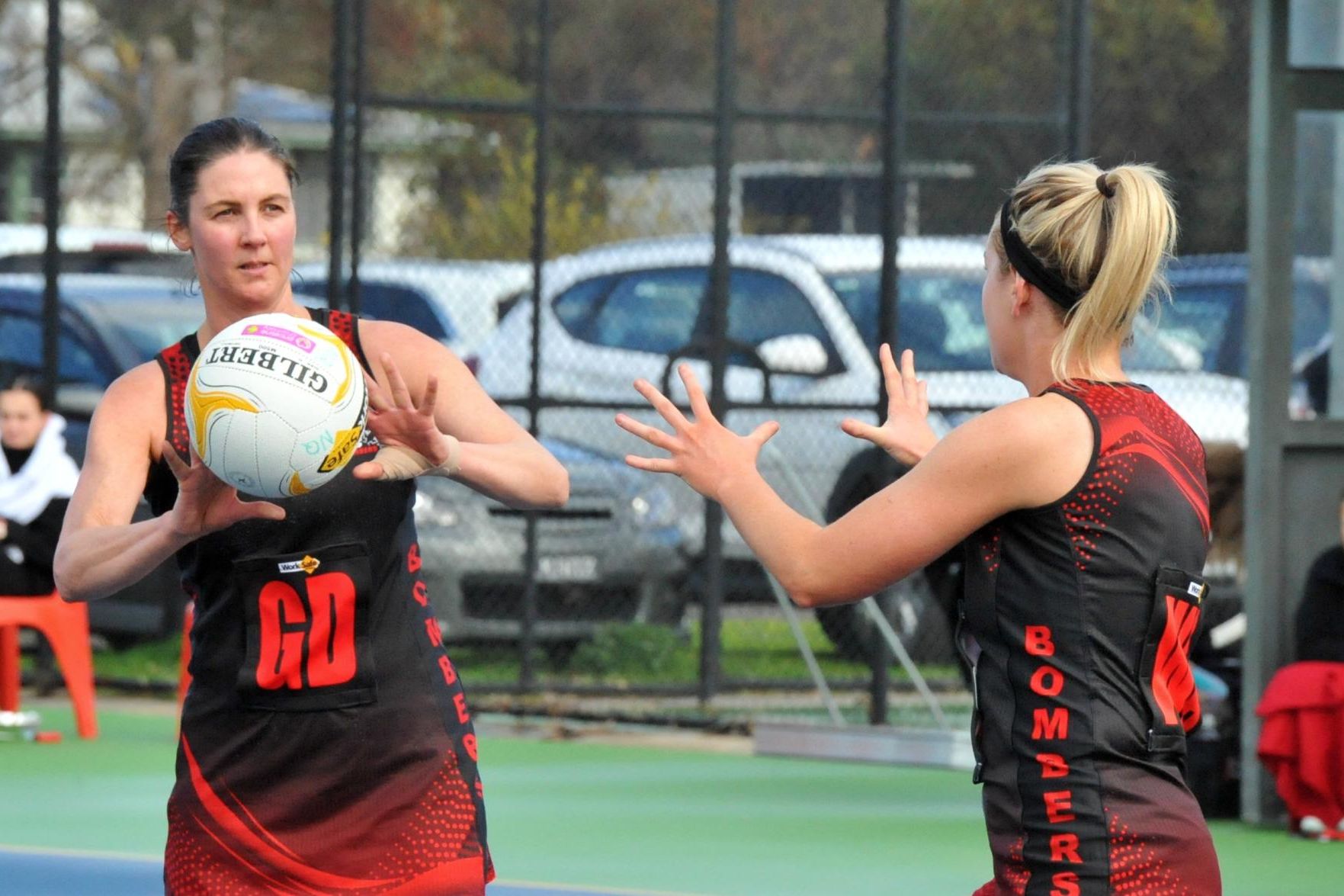 Noradjuha Quantong's standout defender Brooke Pay passes to teammate Jayne Tucker as the Bombers take on the Swifts in round 15 of the HDFNL. Picture by John Hall