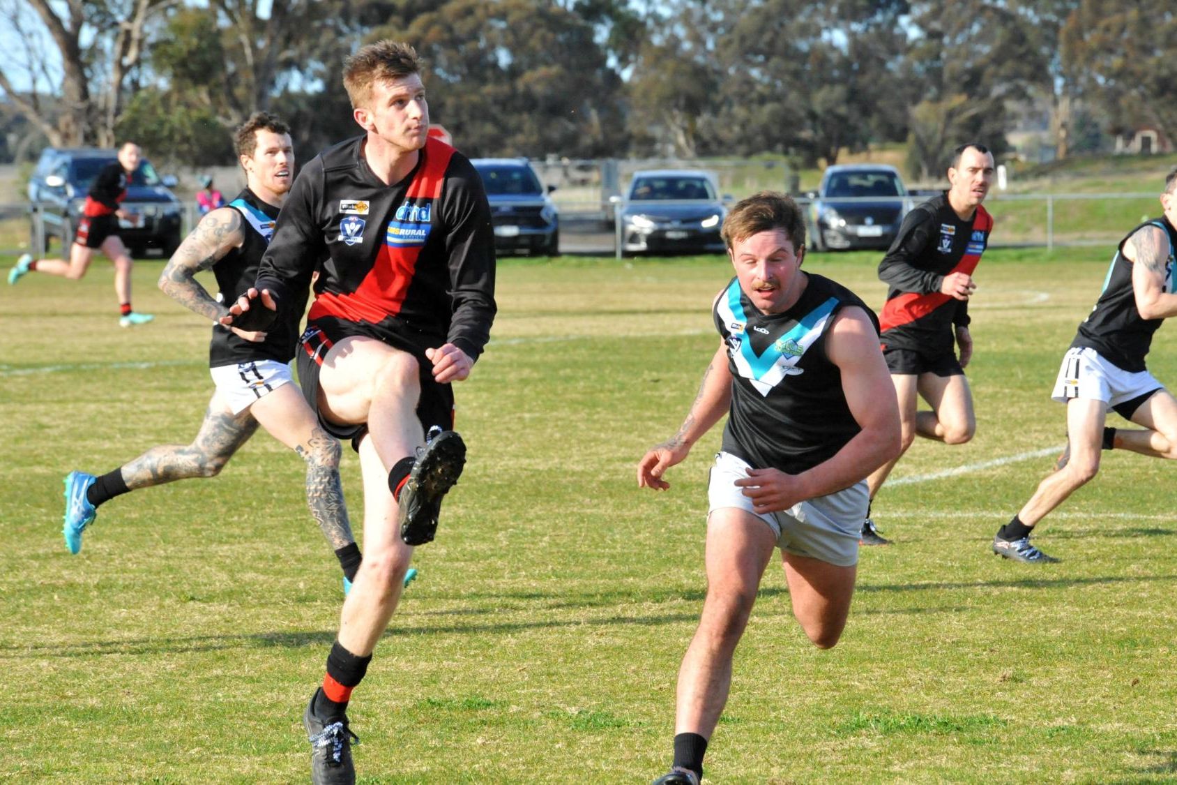 Noradjuha Quantong's Dawson Cross klicks while under pressure from the Swifts' Chevy Elliot when the two sides met during the 2024 HDFNL regular season. Picture by John Hall