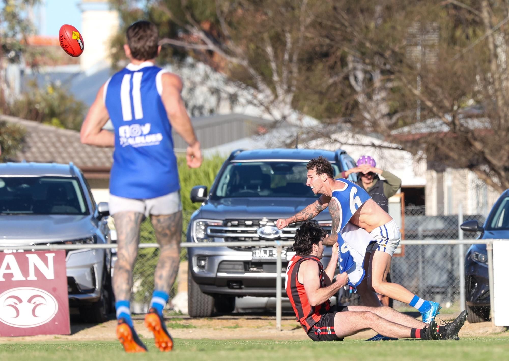 Tom Campbell lays a strong tackle on Donald's Jesse Wallin, ripping his jumper in half. Picture by Blake Lee