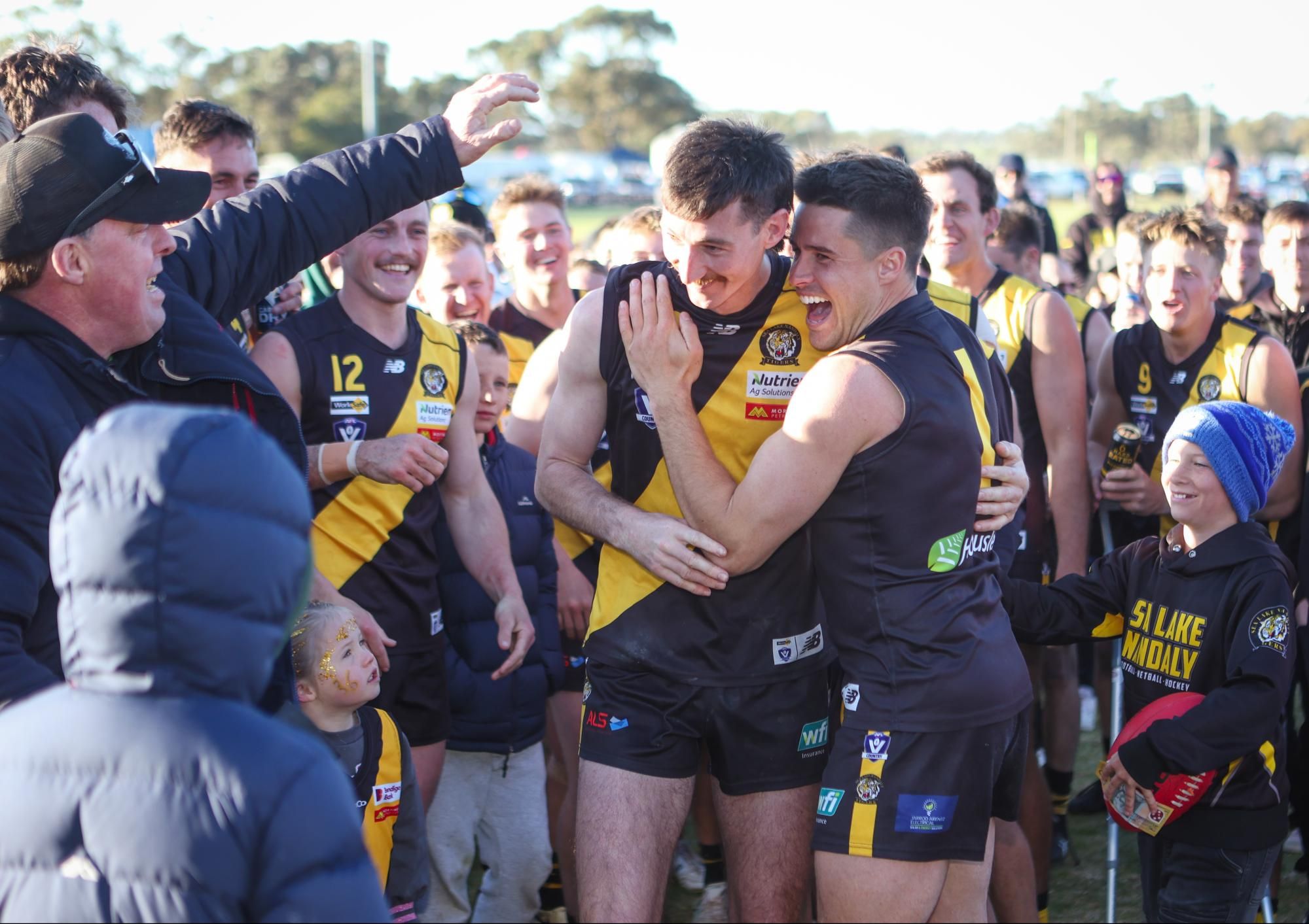 Best on ground Jack Poulton is mobbed by teammates and supporters. Picture by Blake Lee