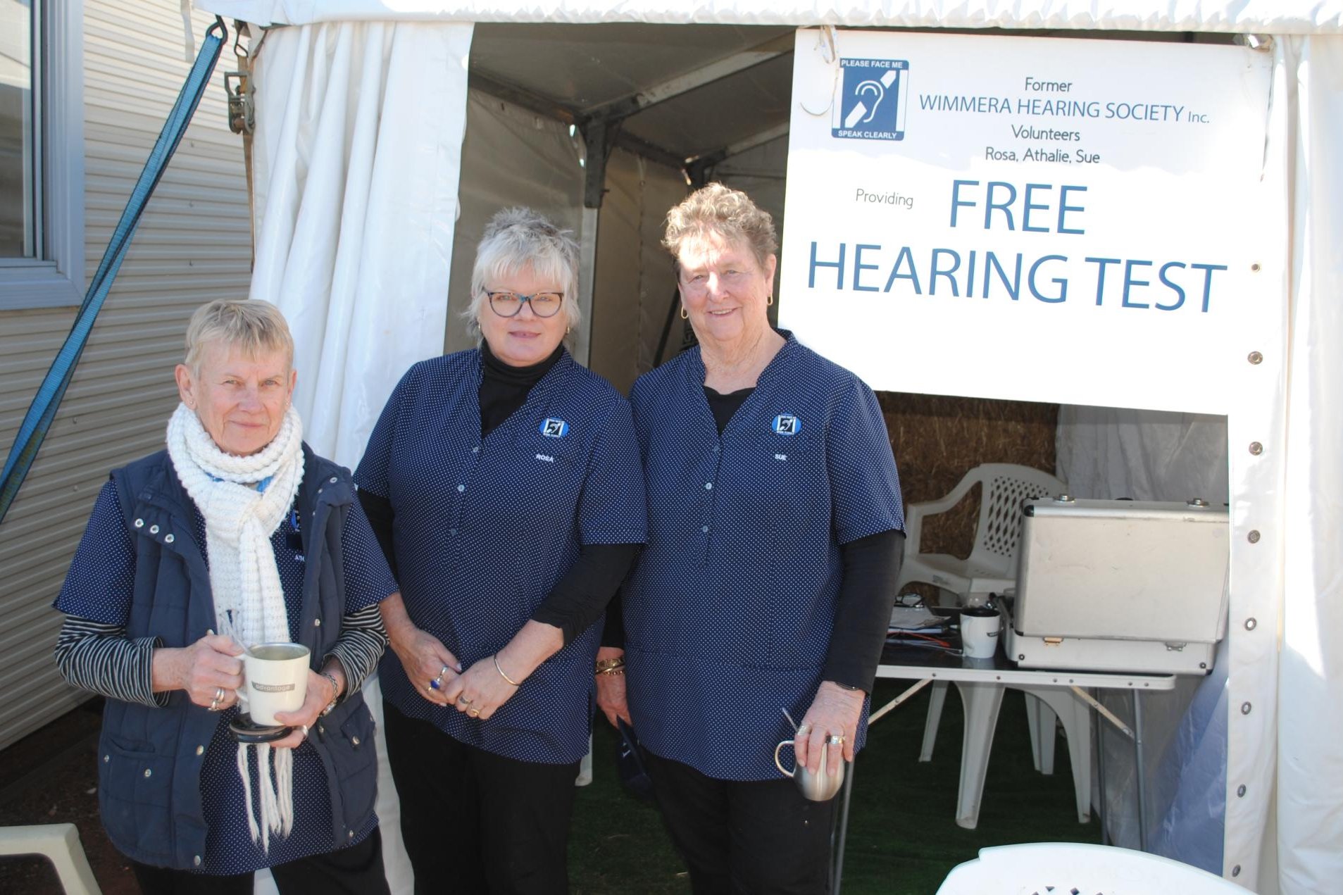 Athalie Lane, Portland, Rosa Vaughan, Heywood, and Sue Ward, Murra Warra, volunteered at the Mallee Machinery Field Days this week to provide free hearing tests for farmers. Picture by Barry Murphy 