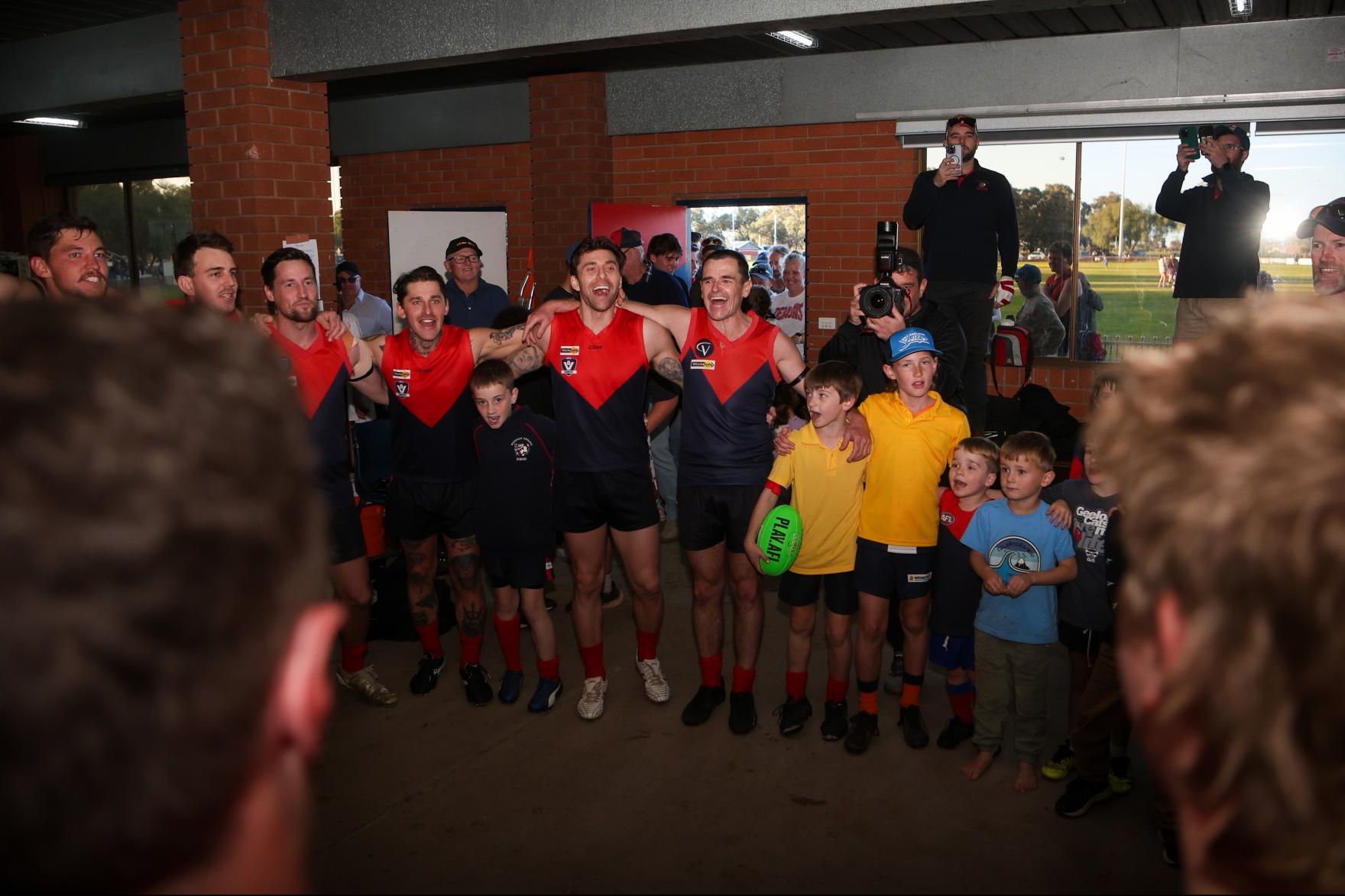 Wycheproof-Narraport players sing their club song after last week's stirring 12-point win over Birchip-Watchem. Picture by Blake Lee