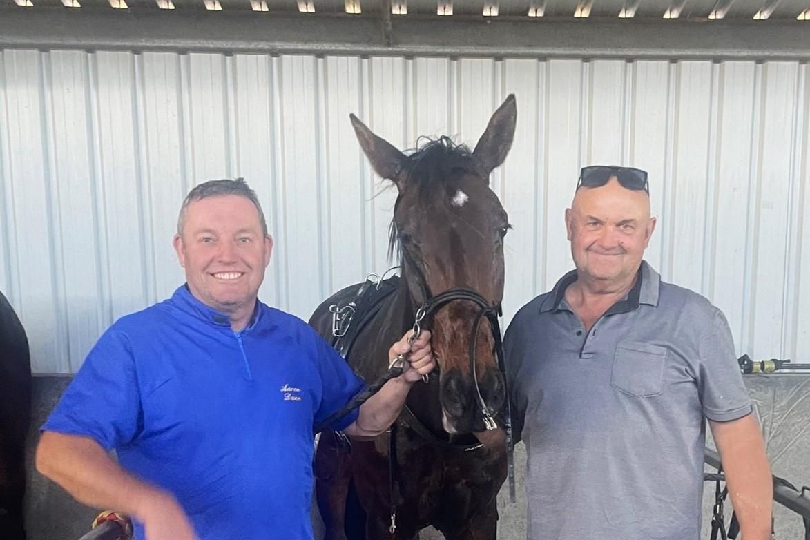 Horsham-based driver Aaron Dunn, left, and owner-trainer Rod Carberry were all smiles after 6yo gelding Vinny Rock scored at Horsham, four starts and ten weeks ago. "Carbs" will be hoping that Ararat reinsman Michael Bellman weaves the same magic at Stawell on Friday afternoon with "Vinny" drawn gate two in race two, the Judith McLeod Memorial.. Picture supplied