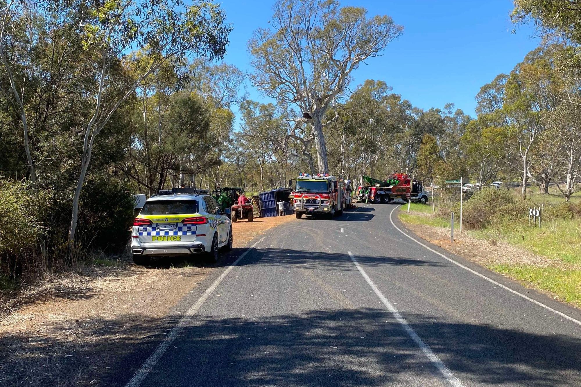Emergencies services are working to free a man after his truck after it rolled over on the outskirts of Balmoral. Picture supplied by Jamie Chandler