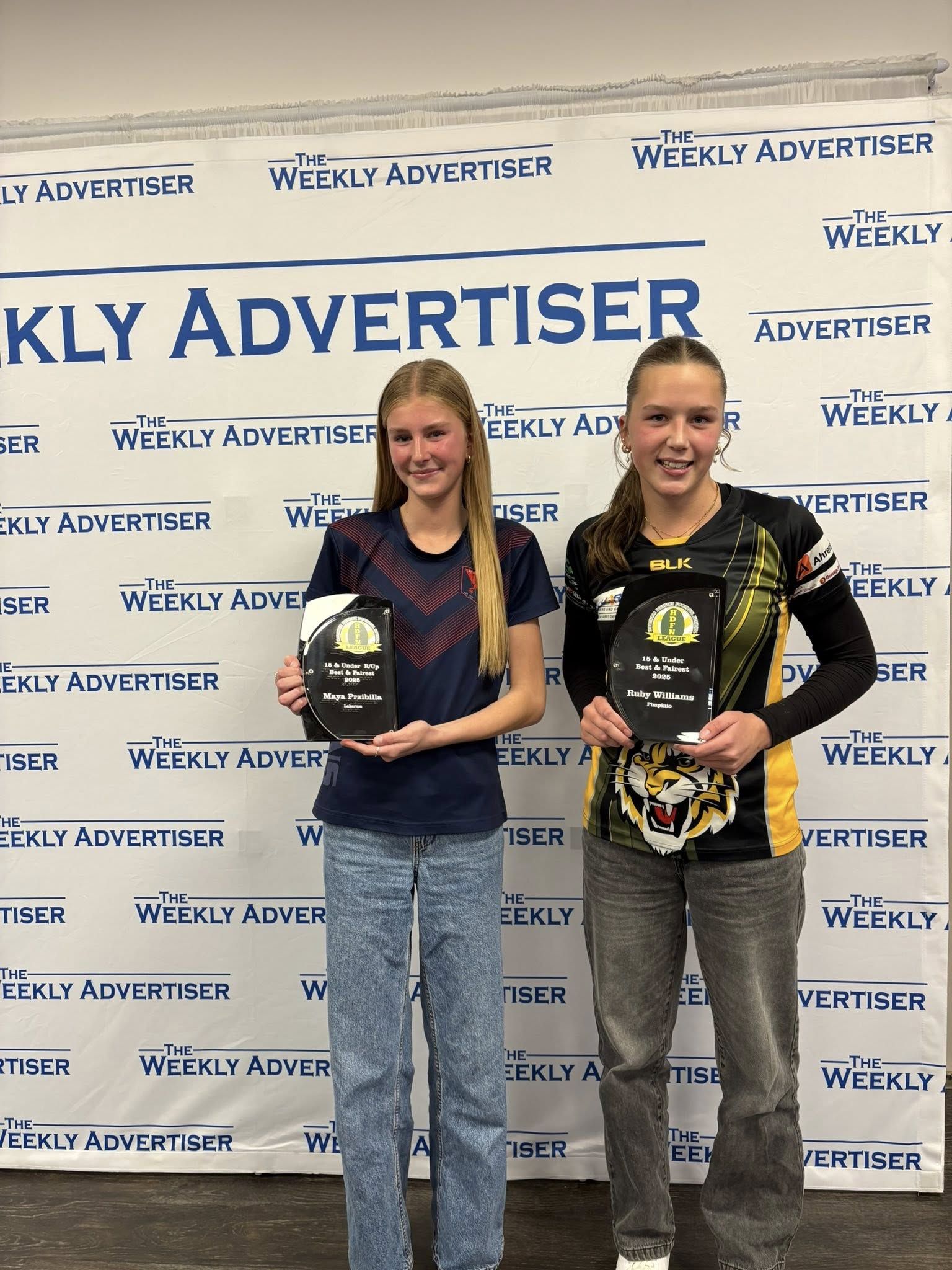 HDFNL under 15s netball best and fairest runner-up Maya Przibilla (Laharum) and winner Ruby Williams (Pimpinio).