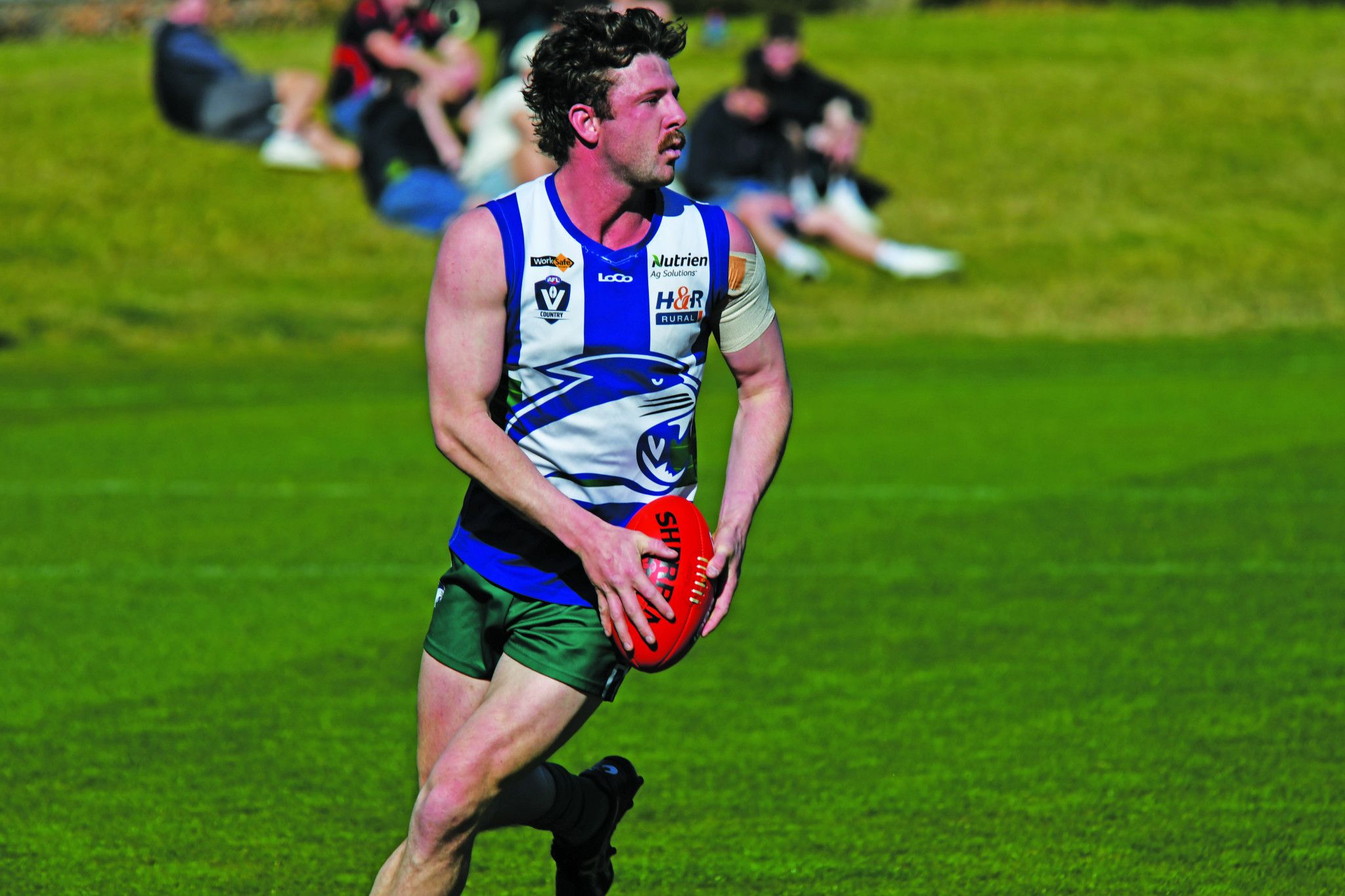 Kaniva Leeor's Jason McCarthy looks to kick the ball upfield.