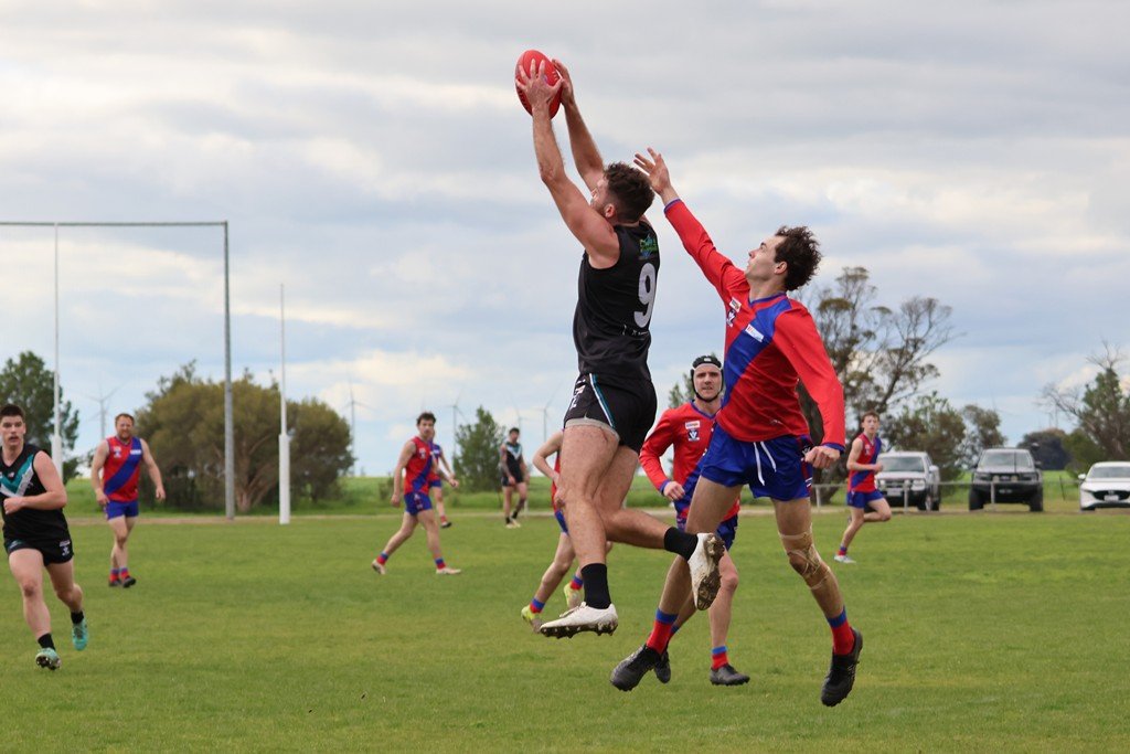 Swifts' Ben Vile takes a mark against Kalkee's Deacan Campbell. Both teams ended their seasons in round 18 on Saturday, with the Kees prevailing 14.14 (98) to 11.9 (75).