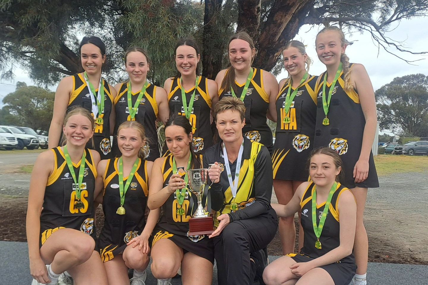 Pimpinio's netball U17 premiership team. The U13 also won and in football the U17s were premiers.