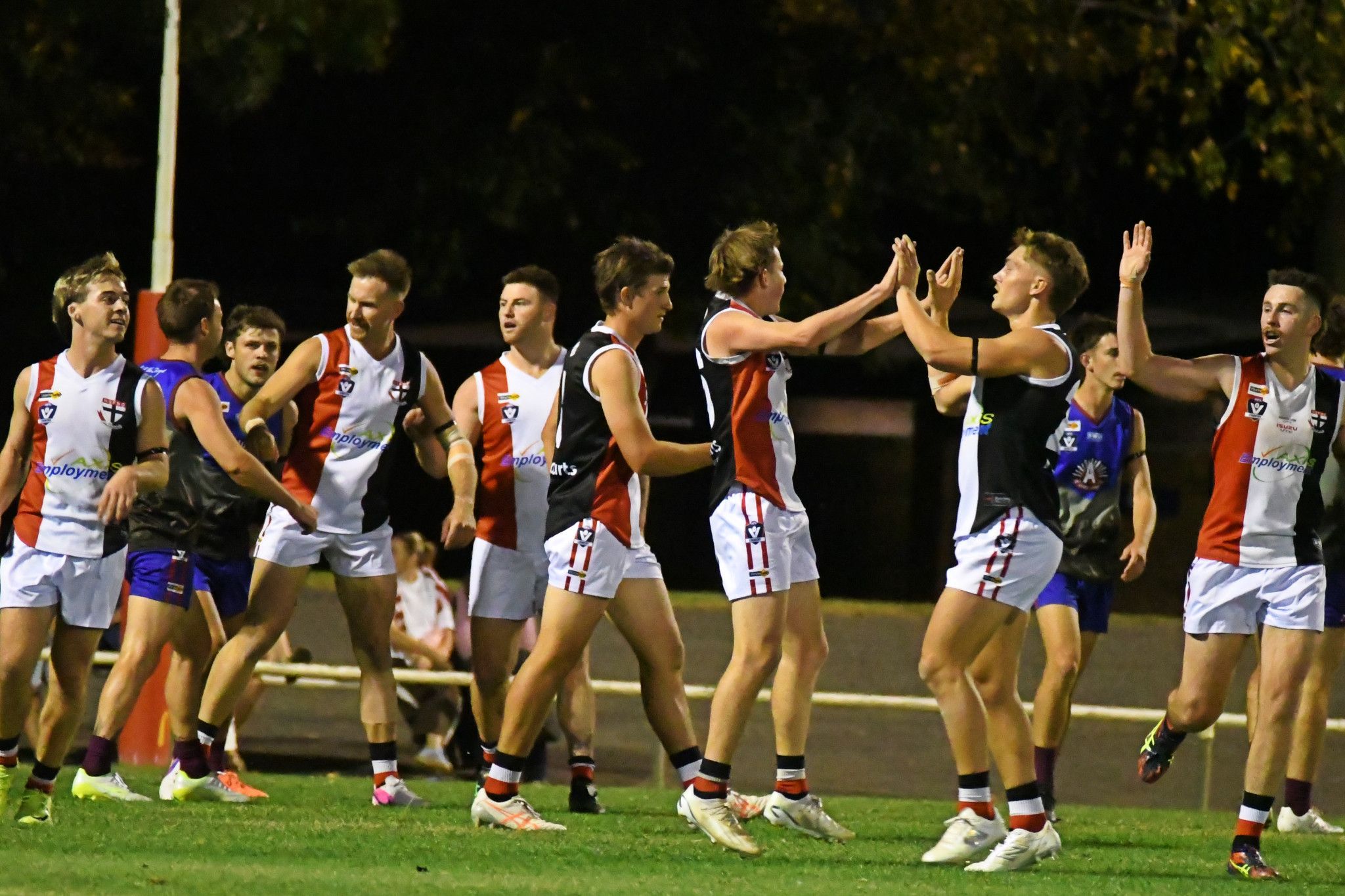 The Demons and Saints battled in front of a strong crowd under lights at City Oval on Anzac Day.