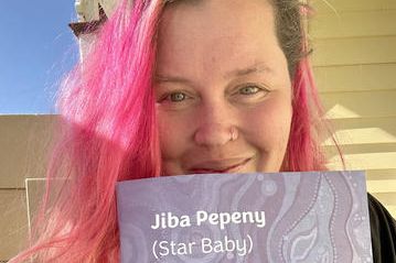 Skye Stewart with her booklet.
