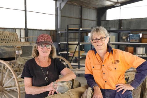 Liz Both and Gianna Sudholz prepare for the open day. PHOTO: Pat Ford