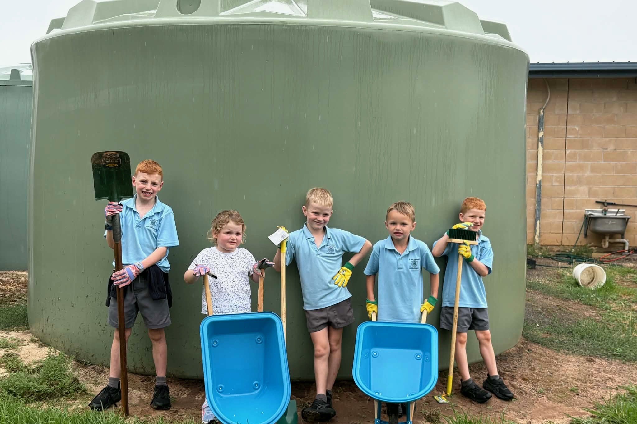 St Mary's students Parker, Sophia, Jack, George and Harvey are all set to prepare their new eco-garden at the school.