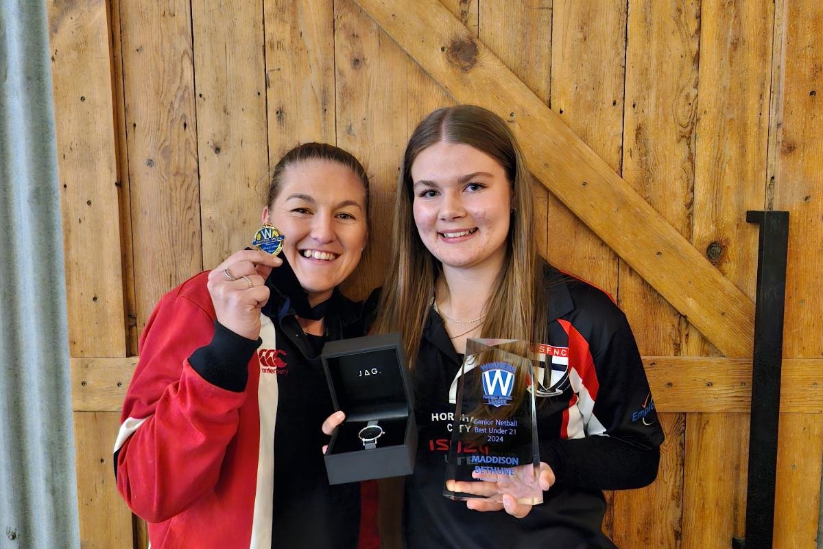 Ashlee Grace finally celebrates a Hatcher medal (left) with team-mate Maddison Bethune who won the under-21.