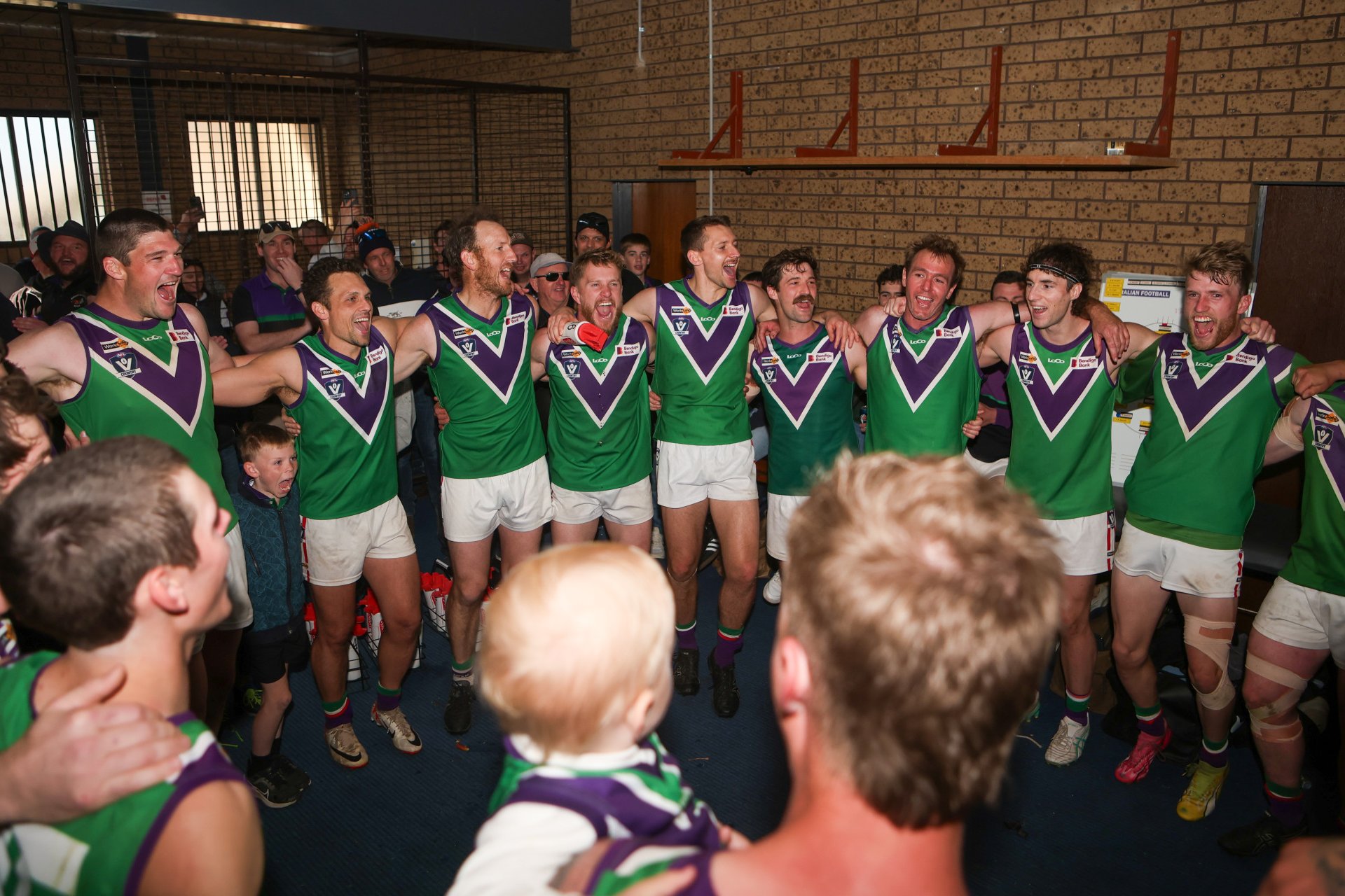 The Bulls singing their song after the match. PHOTO: BLAKE LEE
