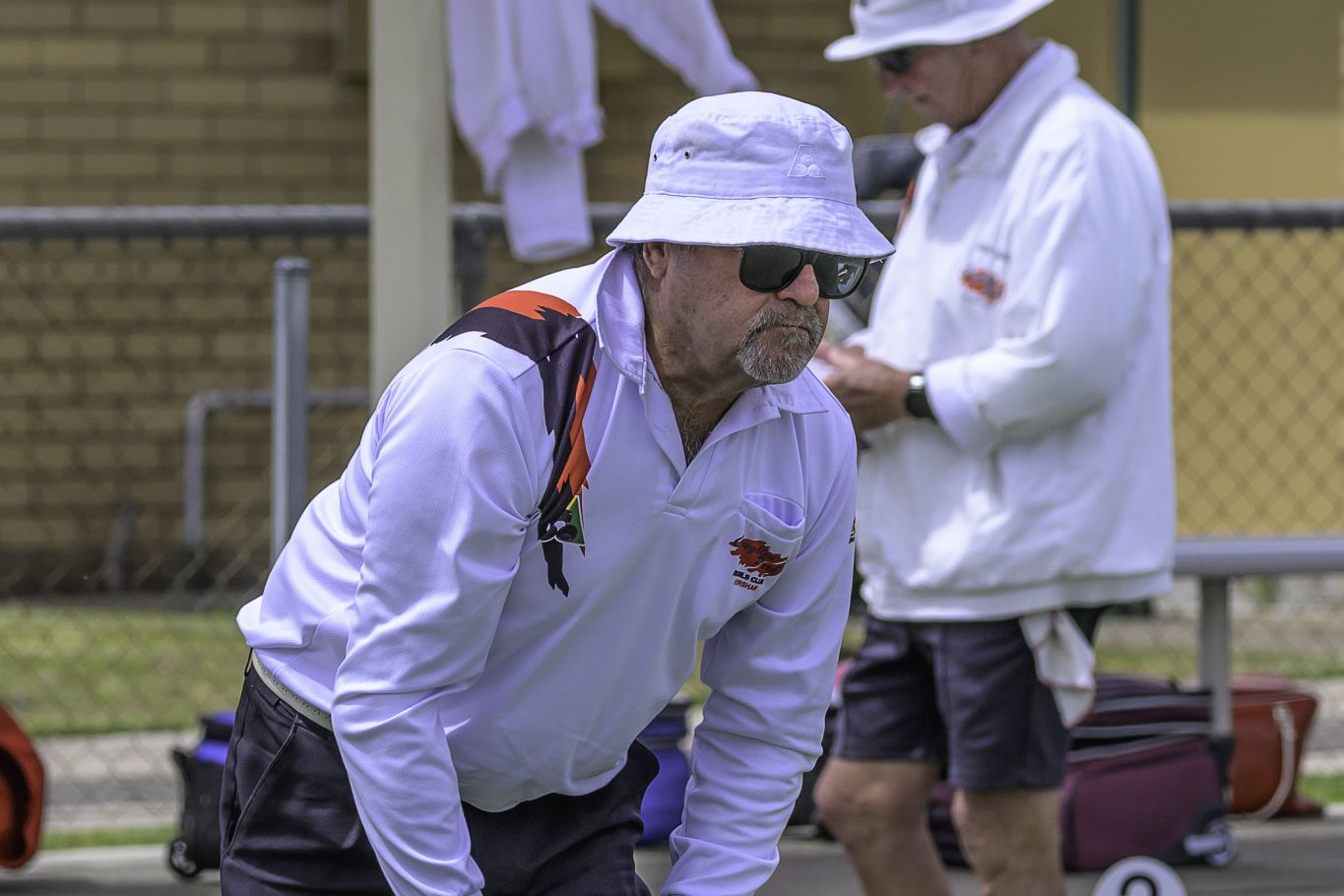 Coughlin Park's skipper Charles Officer assess his bowl.