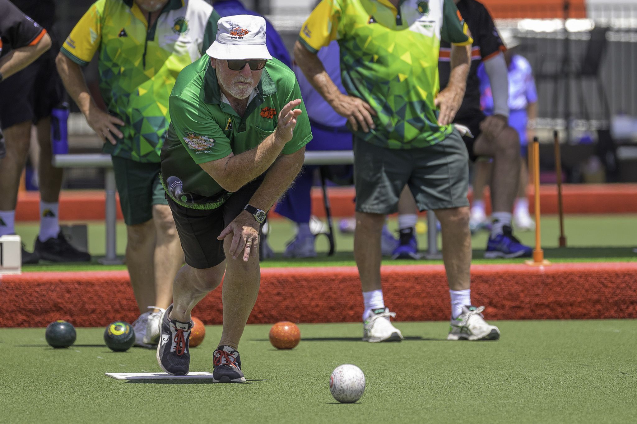 Darryl Argall holds his form following a bowl during his side's clash against Coughlin Park. Photos by ROBIN WEBB.